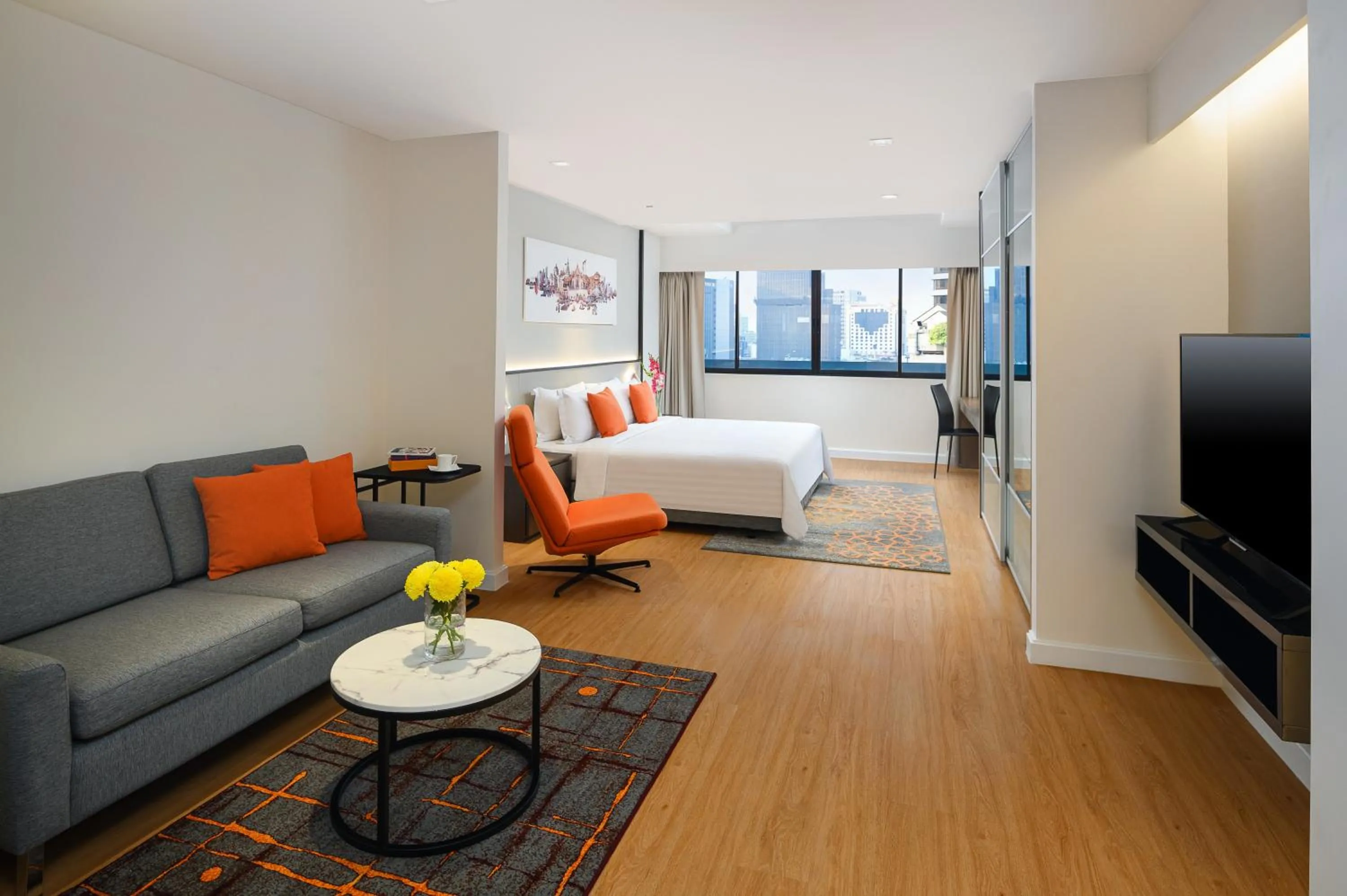 Bed in PARKROYAL Suites Bangkok