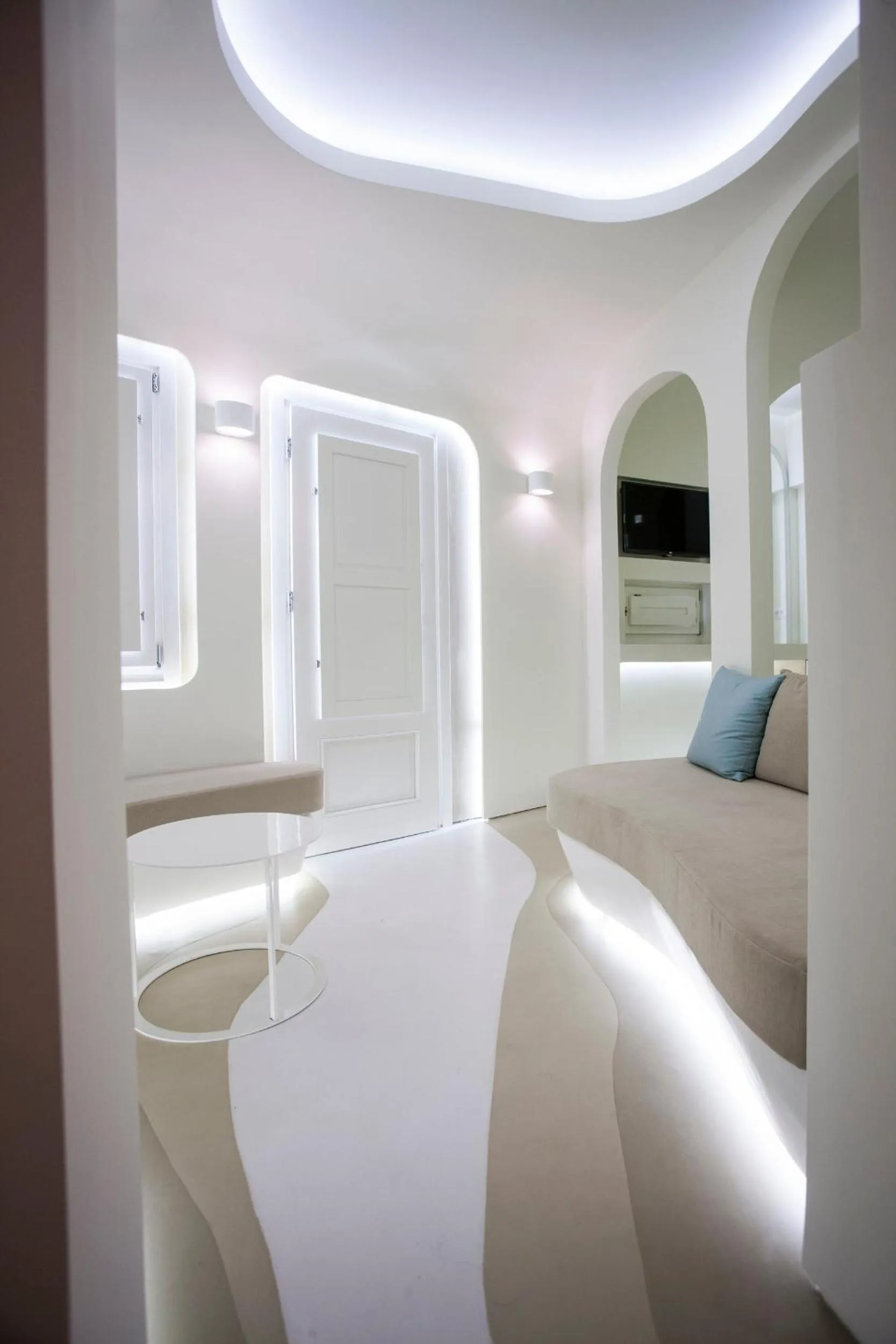 Seating area, Bed in Andronikos Santorini