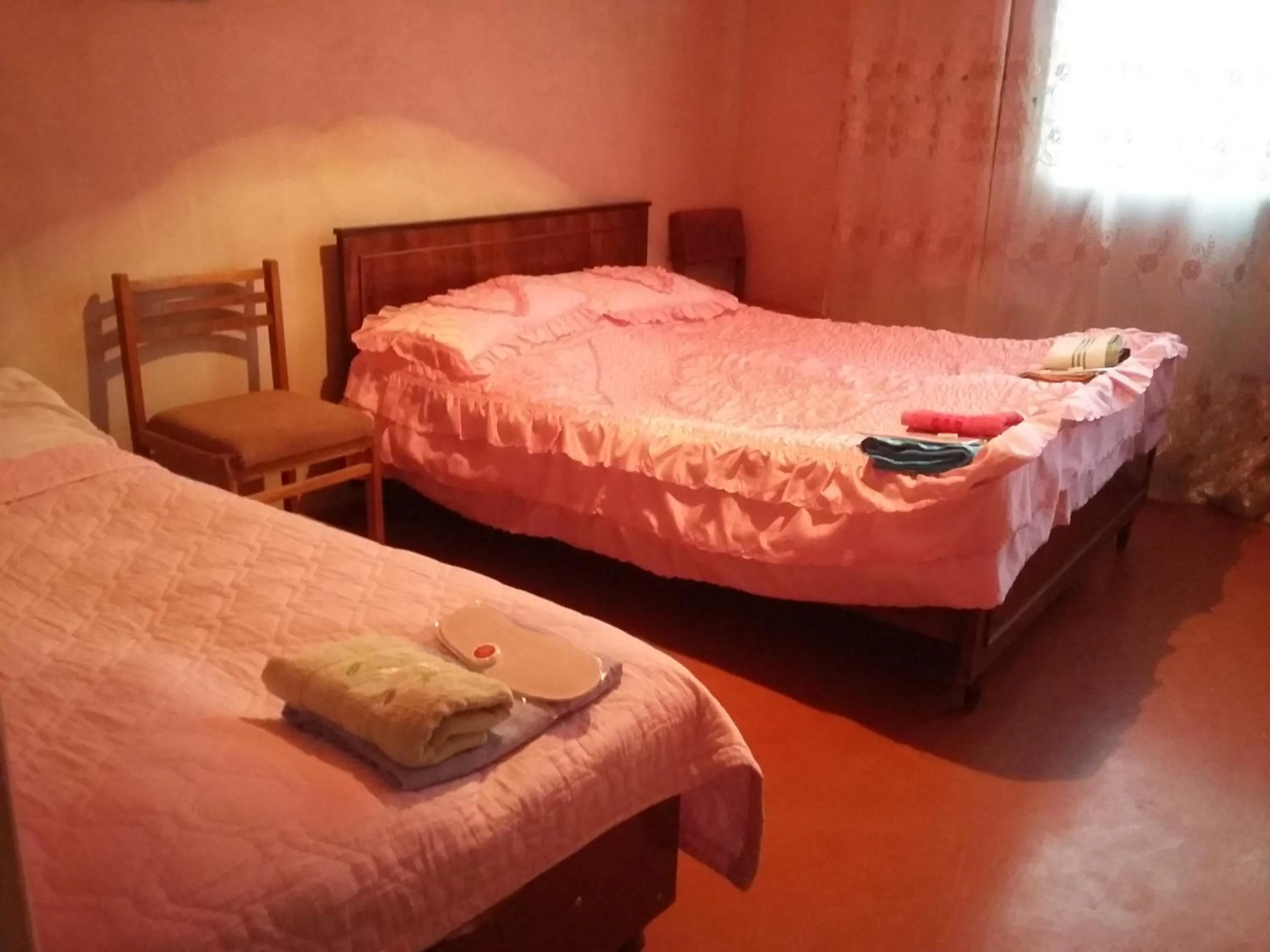 Bed in Shushan GUEST HOUSE