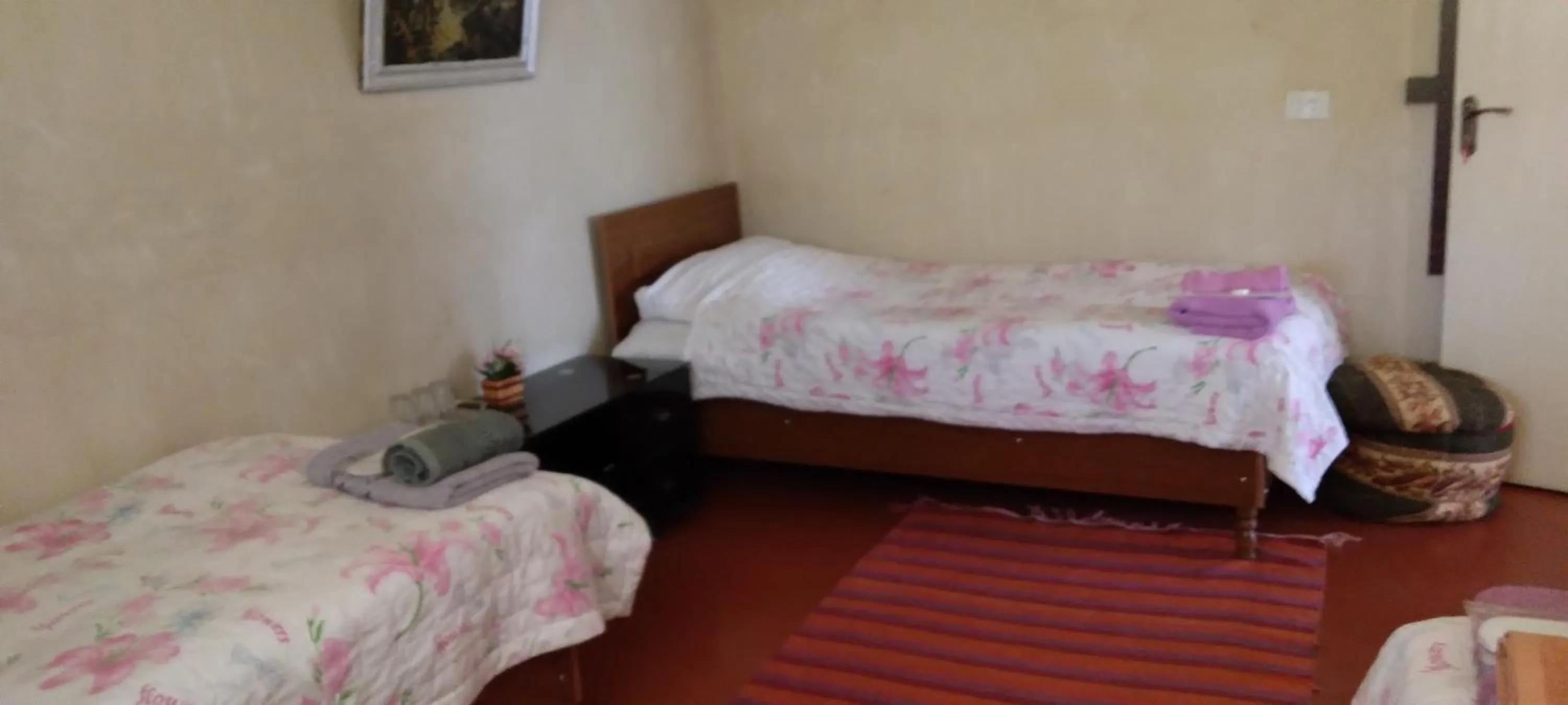 Bed in Shushan GUEST HOUSE