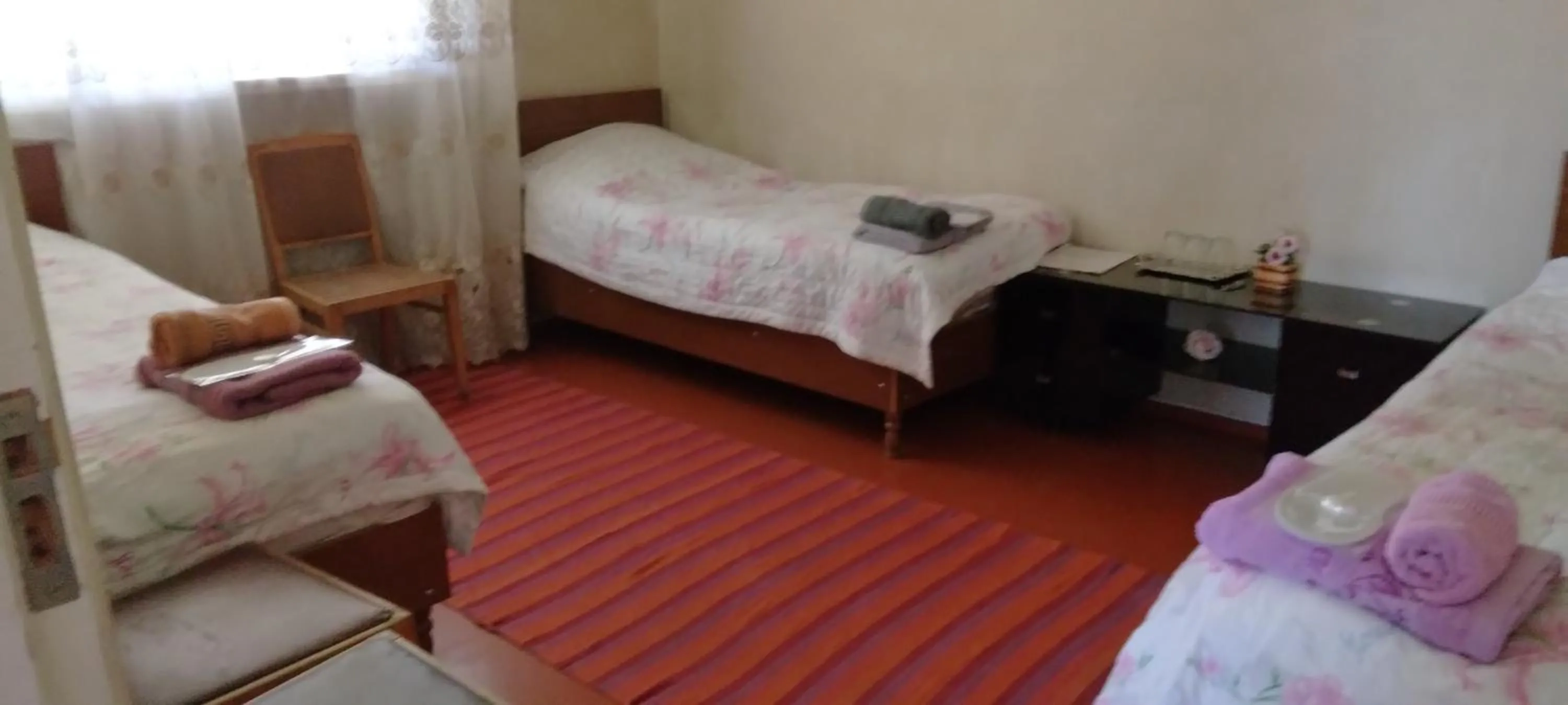 Bed in Shushan GUEST HOUSE