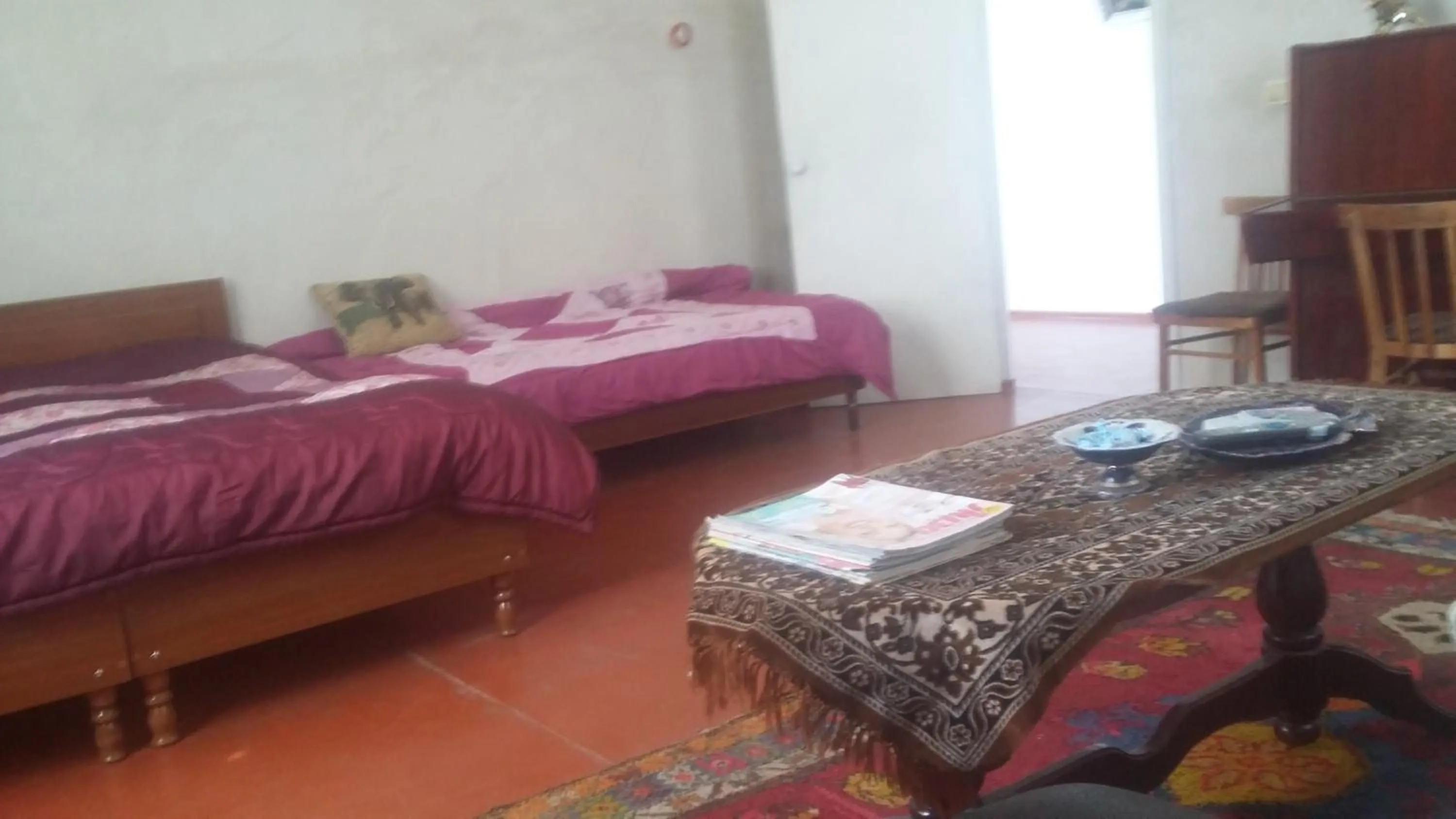 Photo of the whole room, Bed in Shushan GUEST HOUSE