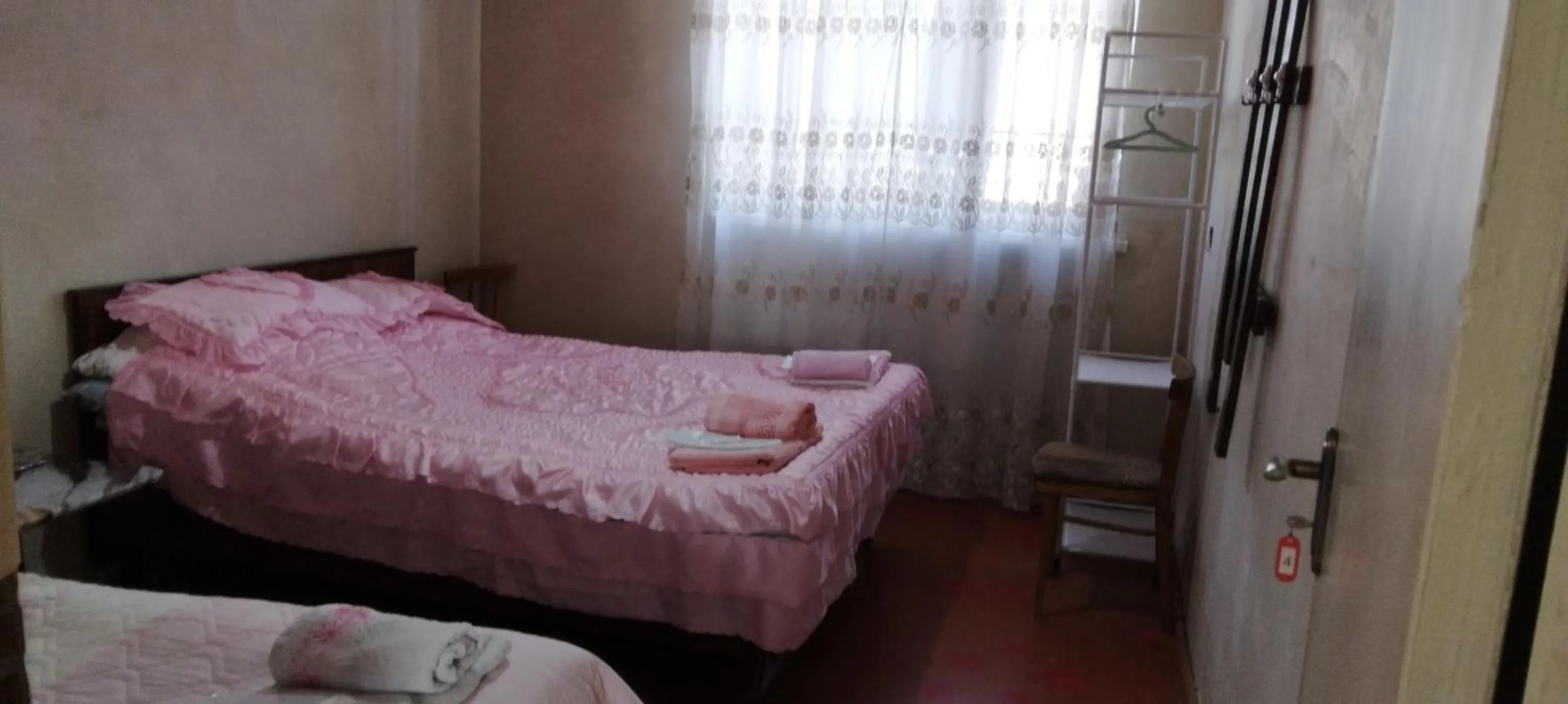 Bed in Shushan GUEST HOUSE
