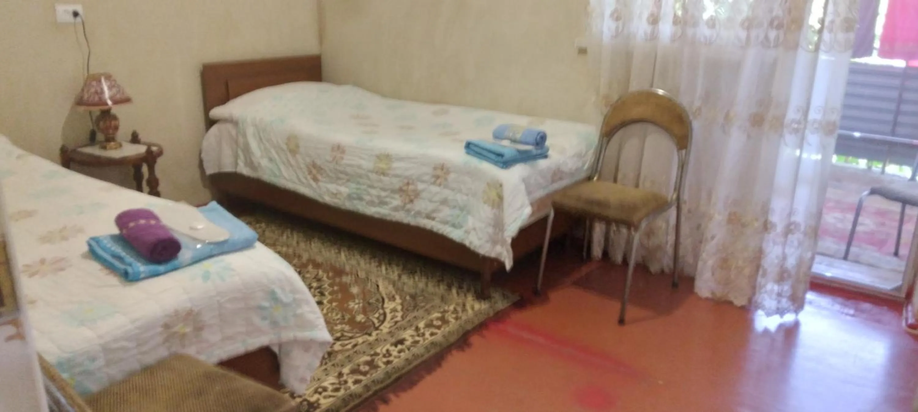 Bed in Shushan GUEST HOUSE