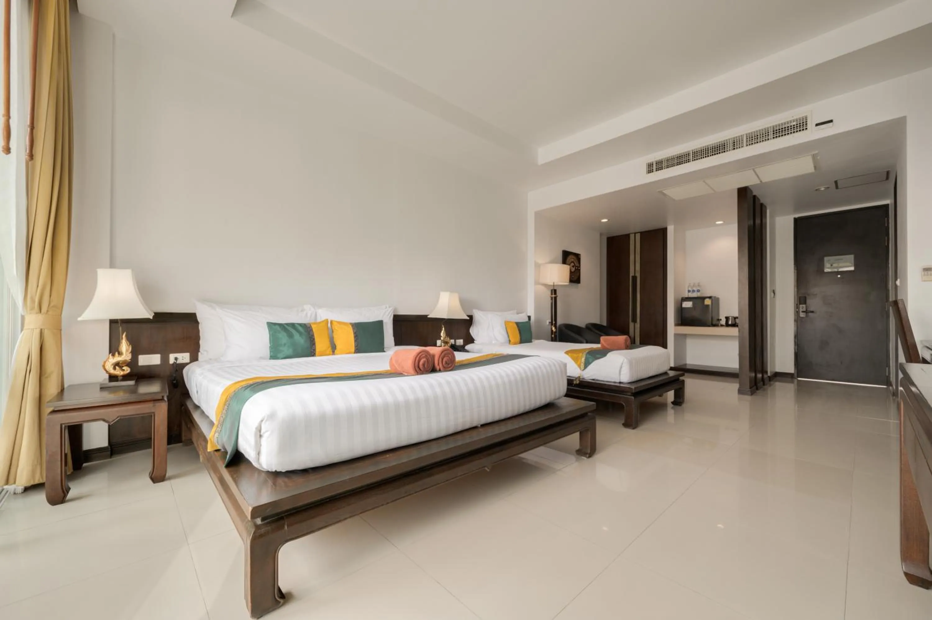 Bed in Baan Karonburi Resort