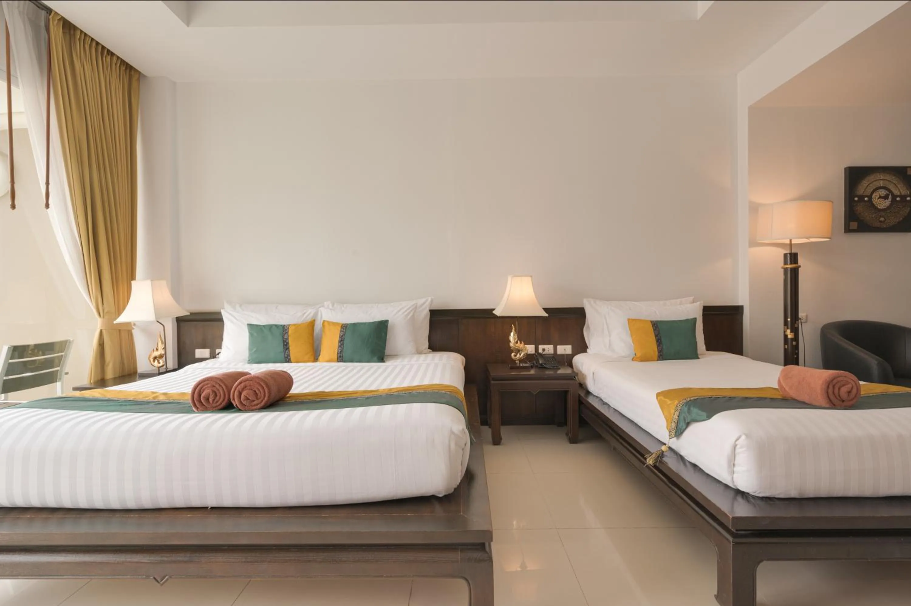 Bed in Baan Karonburi Resort