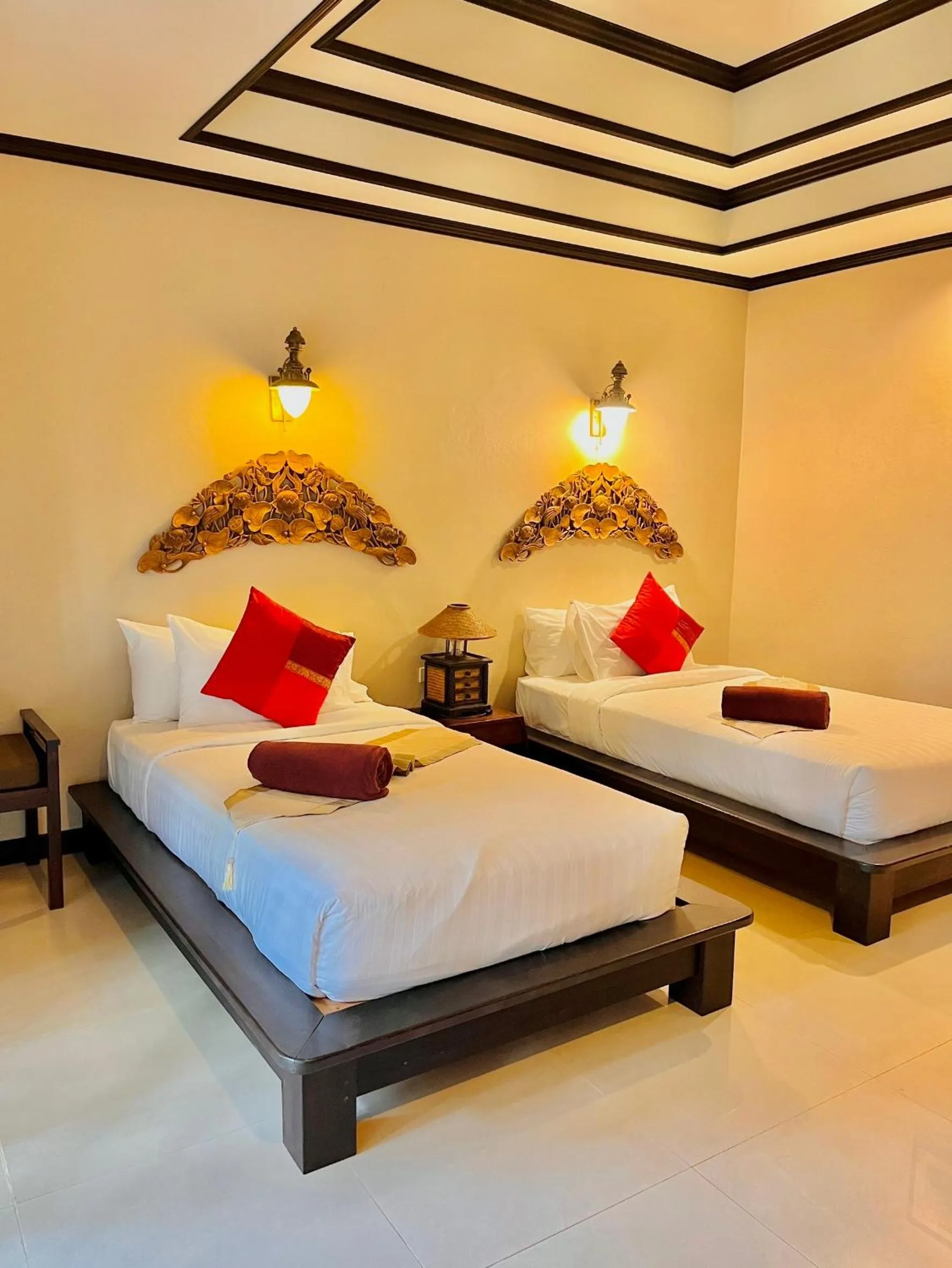 Bed in Kanok Buri Resort