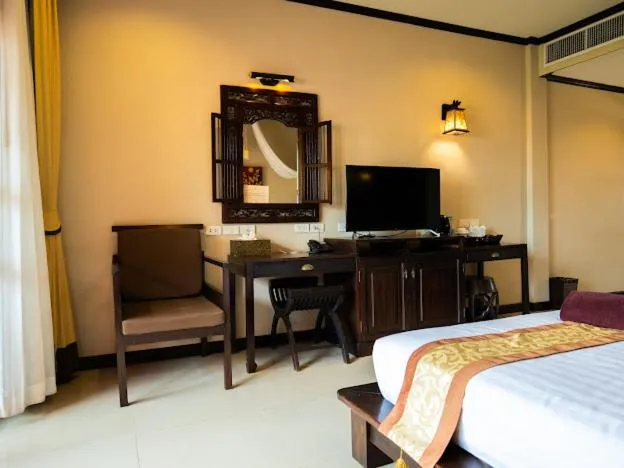 Bed in Kanok Buri Resort