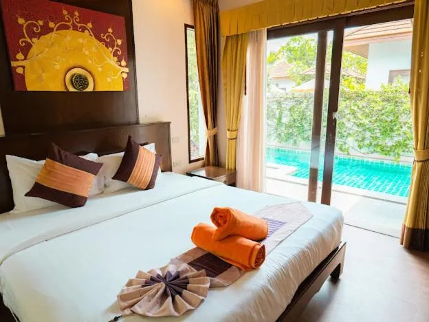 Bed in Kanok Buri Resort