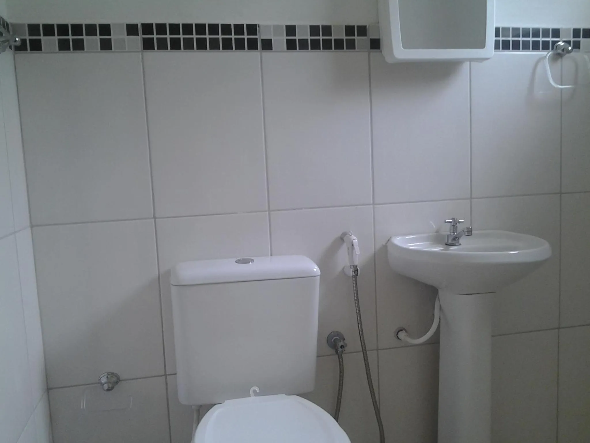 Bathroom in Suítes Córdoba SP