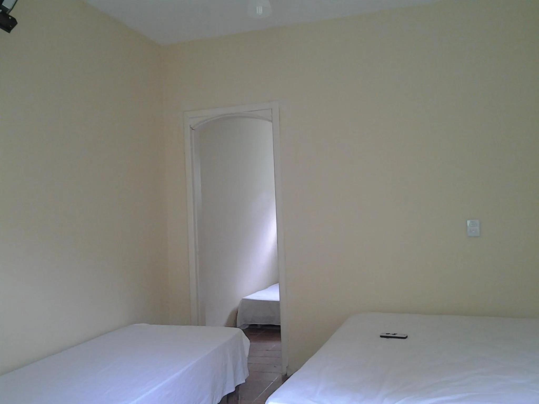Photo of the whole room, Bed in Suítes Córdoba SP