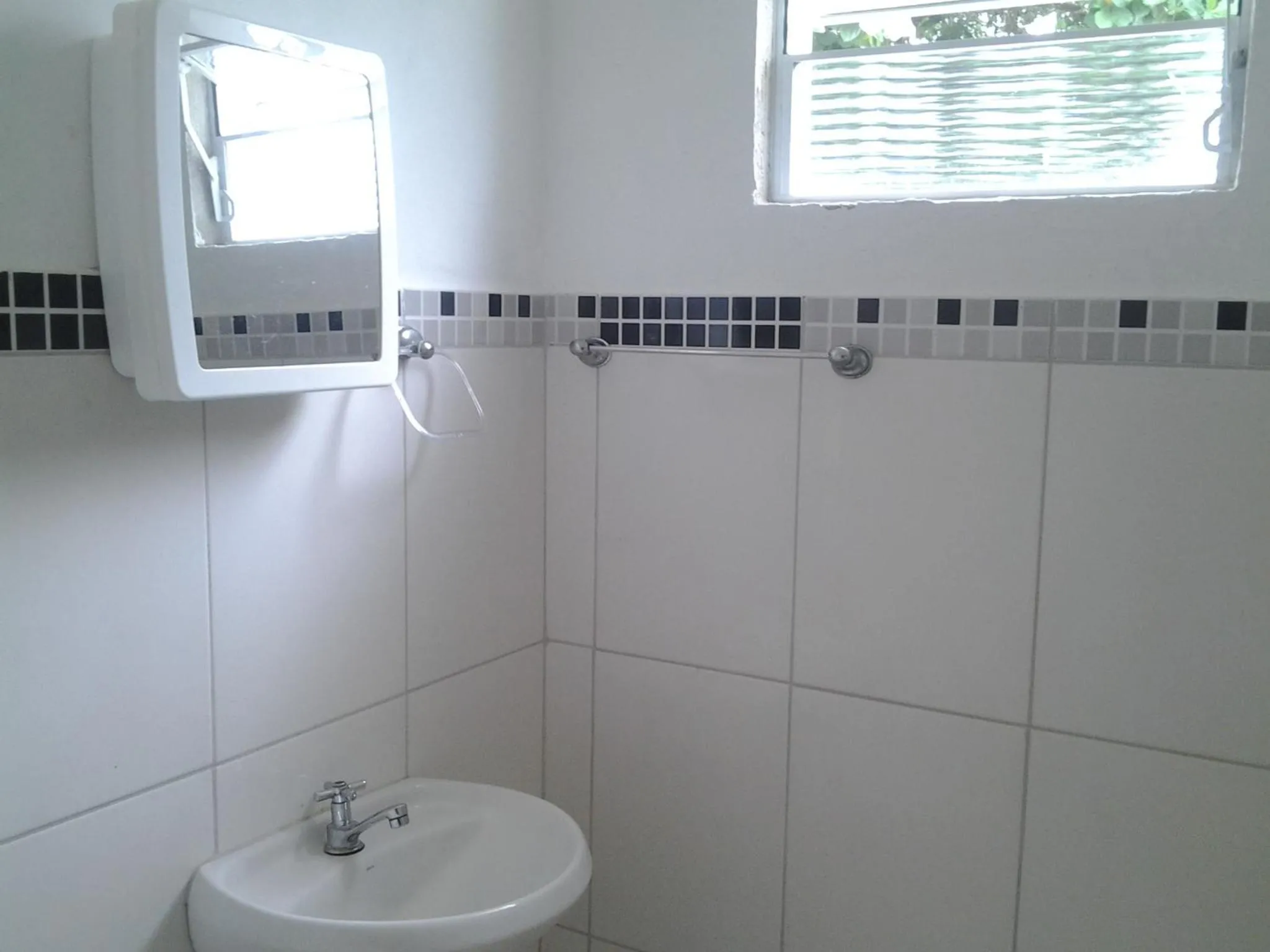 Bathroom in Suítes Córdoba SP