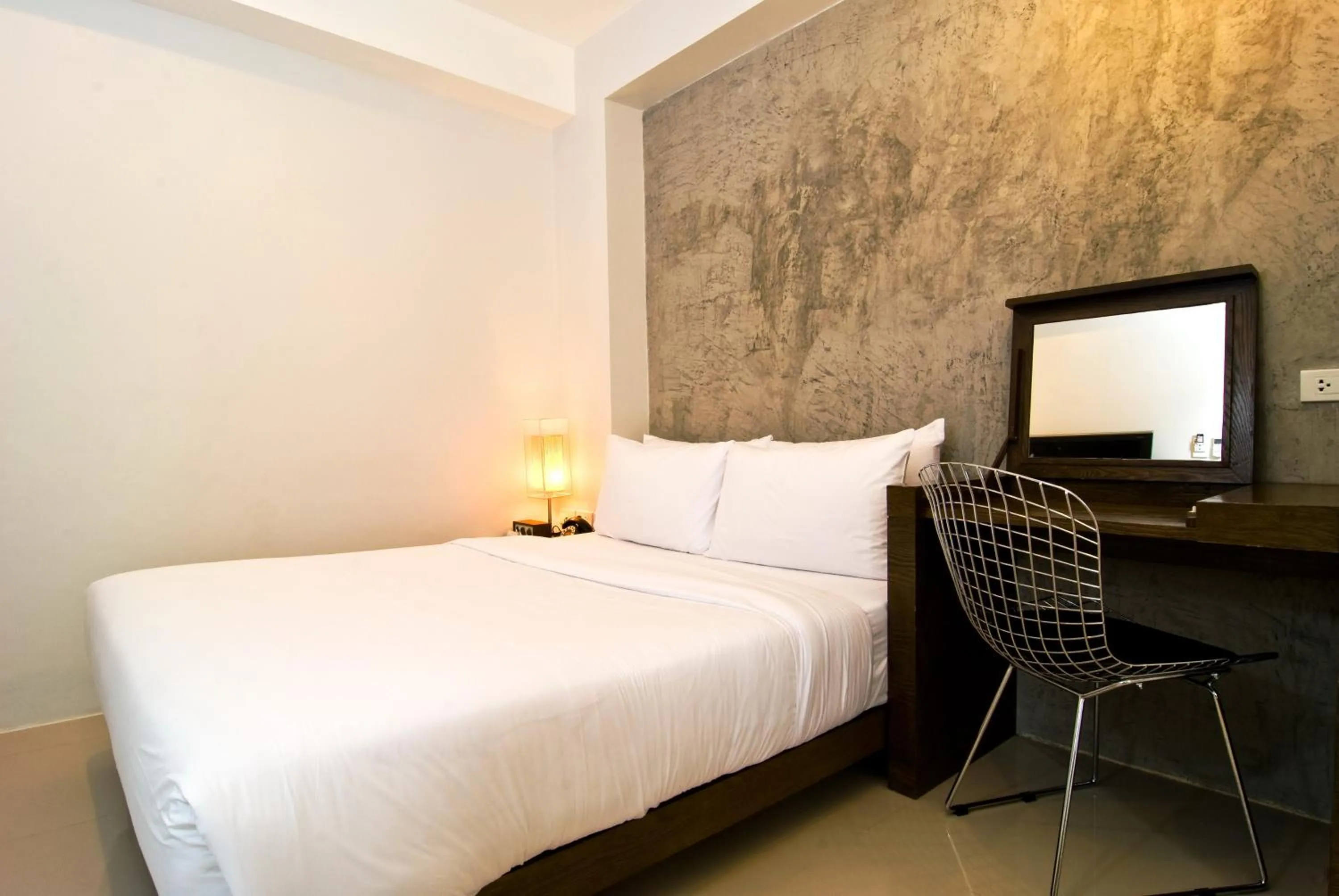 Bed in The Album Hotel