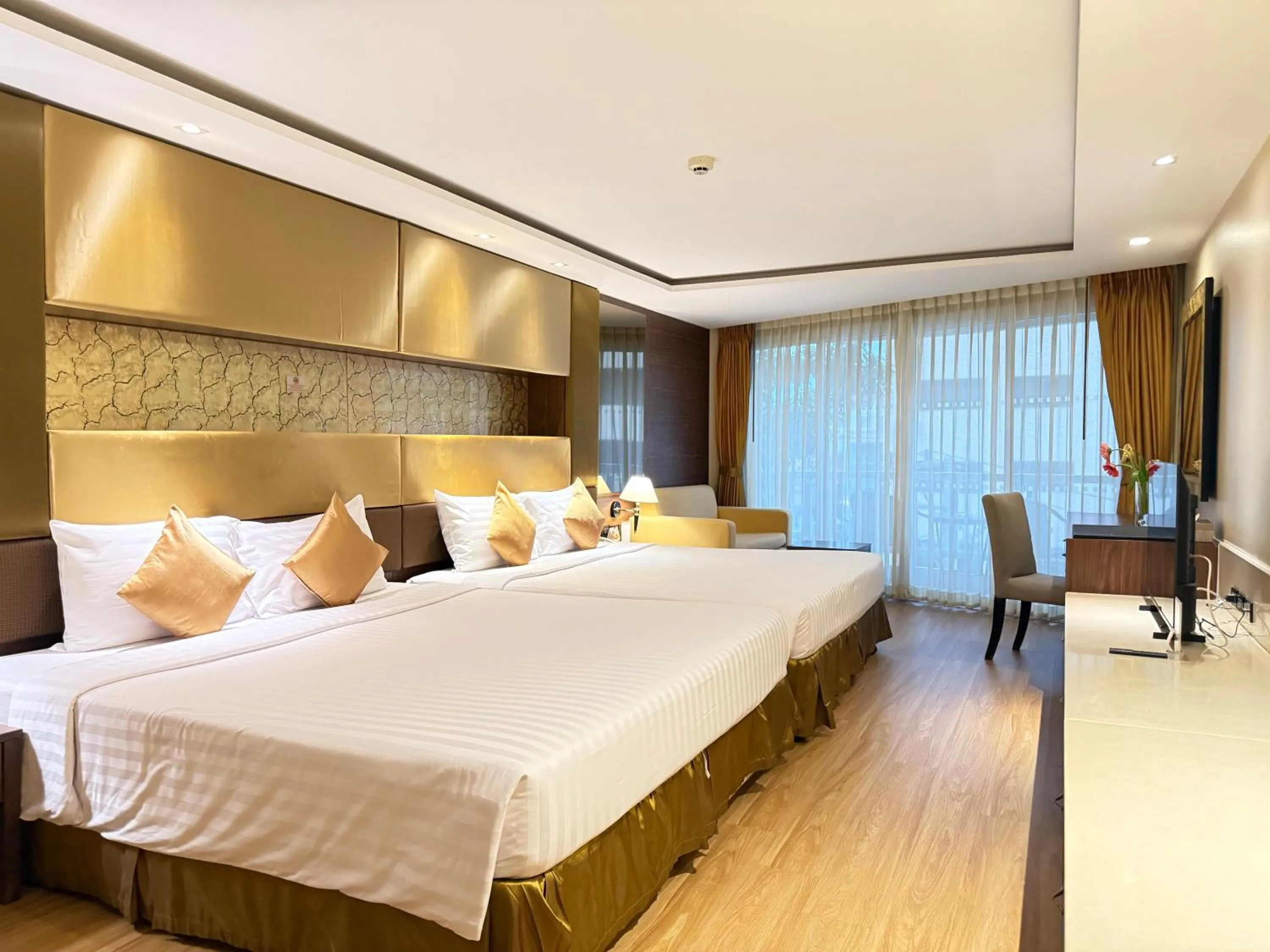 Bed in Nova Gold Hotel Pattaya