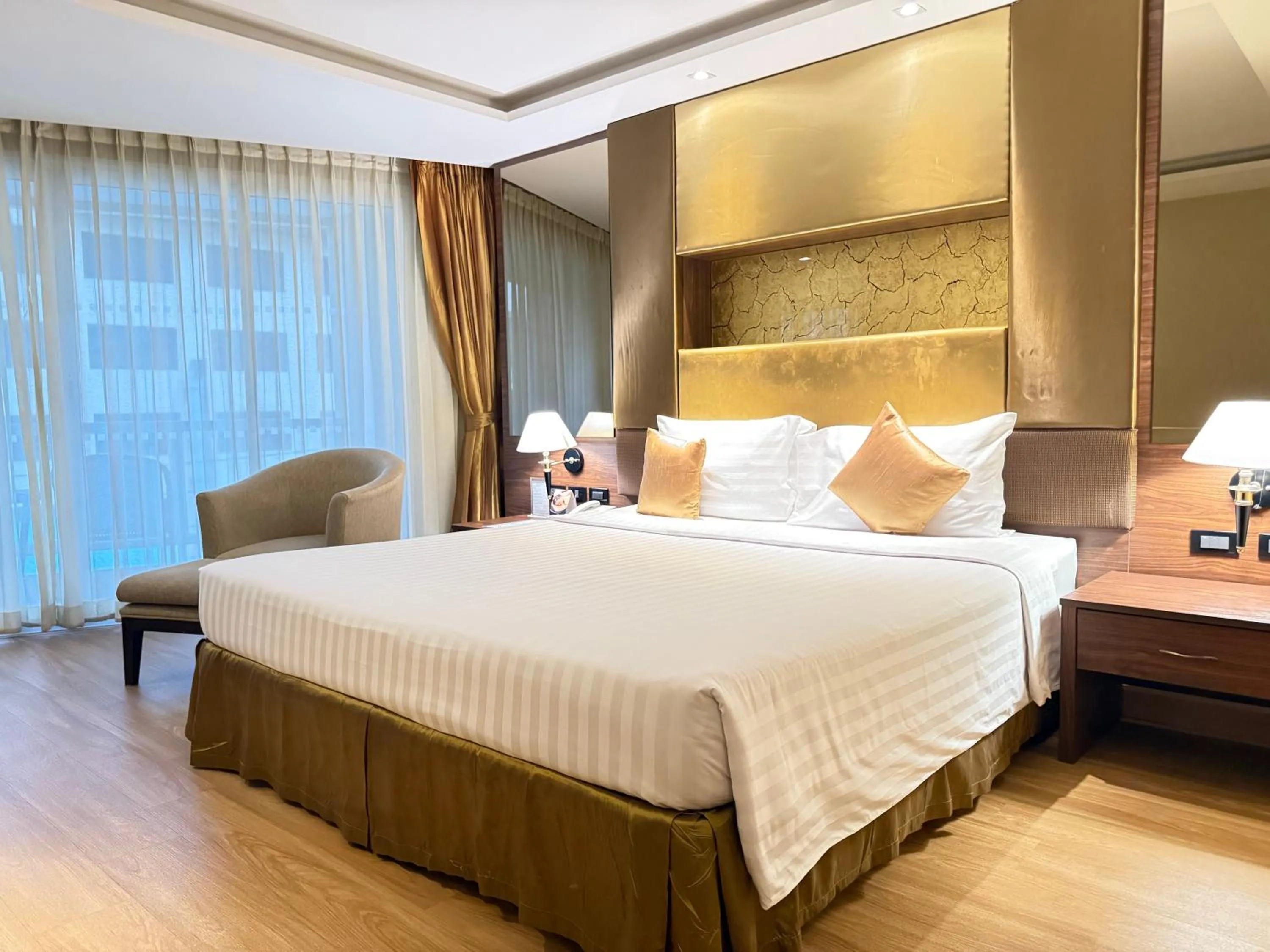 Bed in Nova Gold Hotel Pattaya