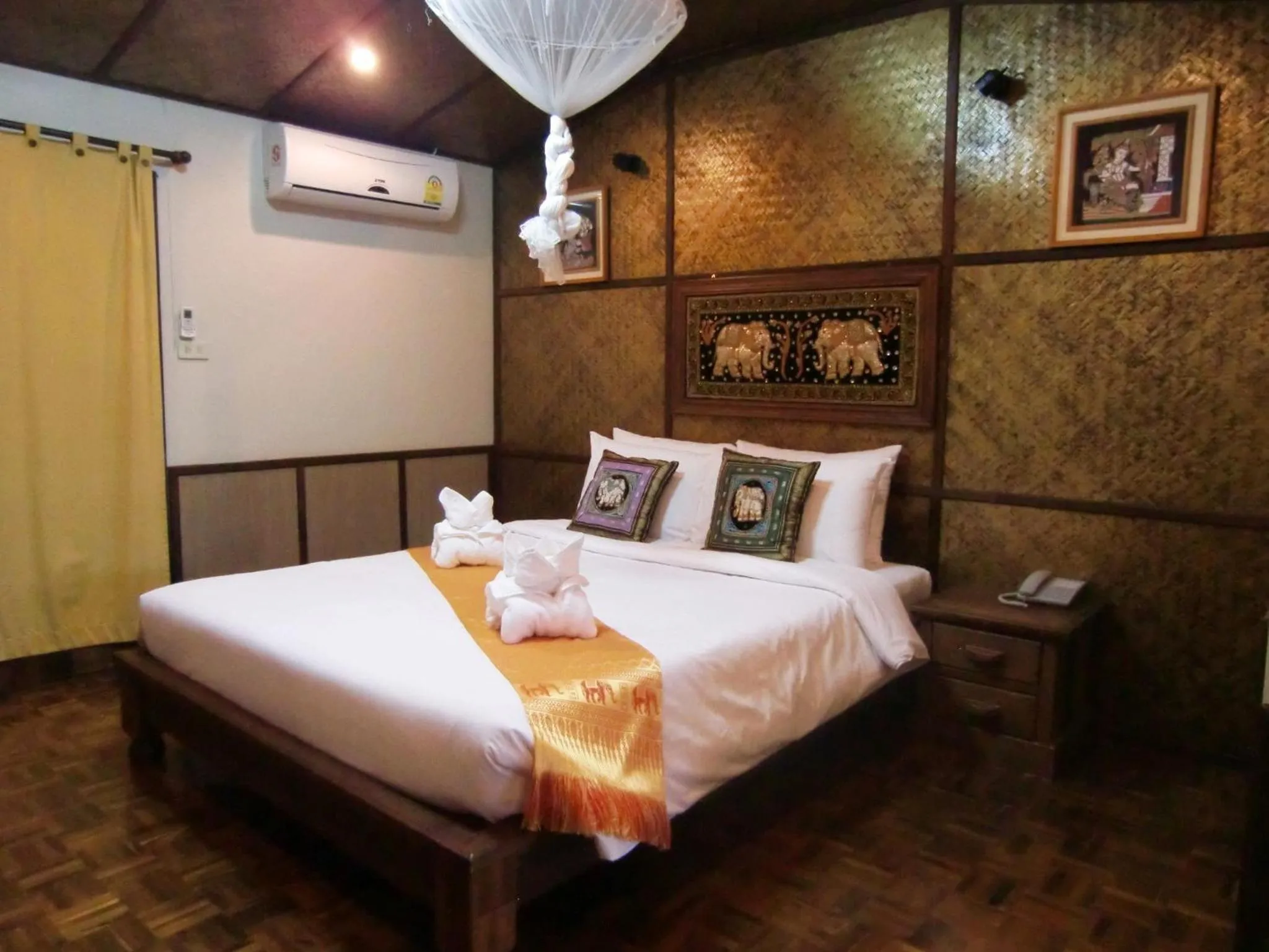 Bed in Marisa Resort & Spa Chiang Dao