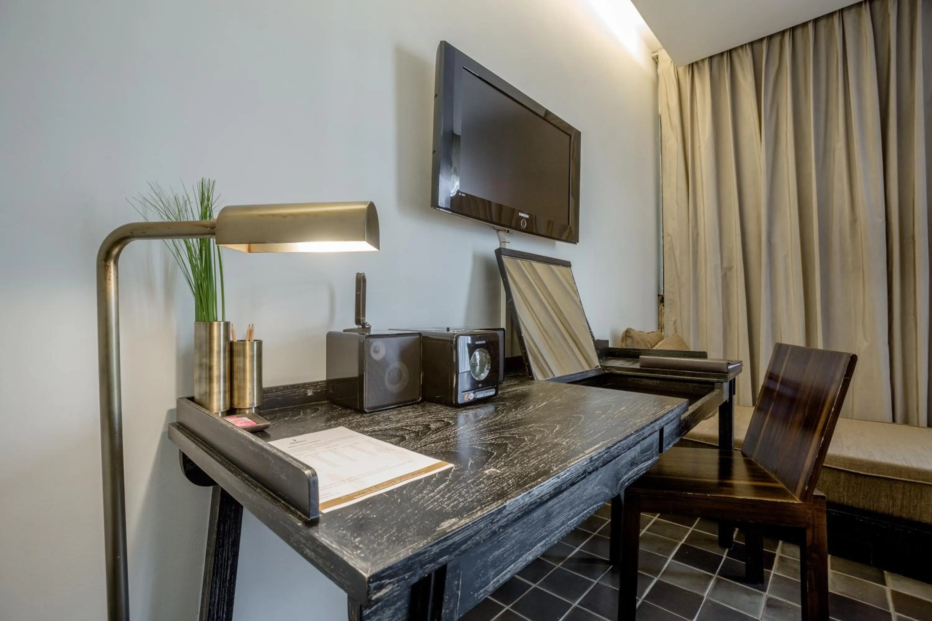 TV and multimedia in Aruntara Riverside Boutique Hotel