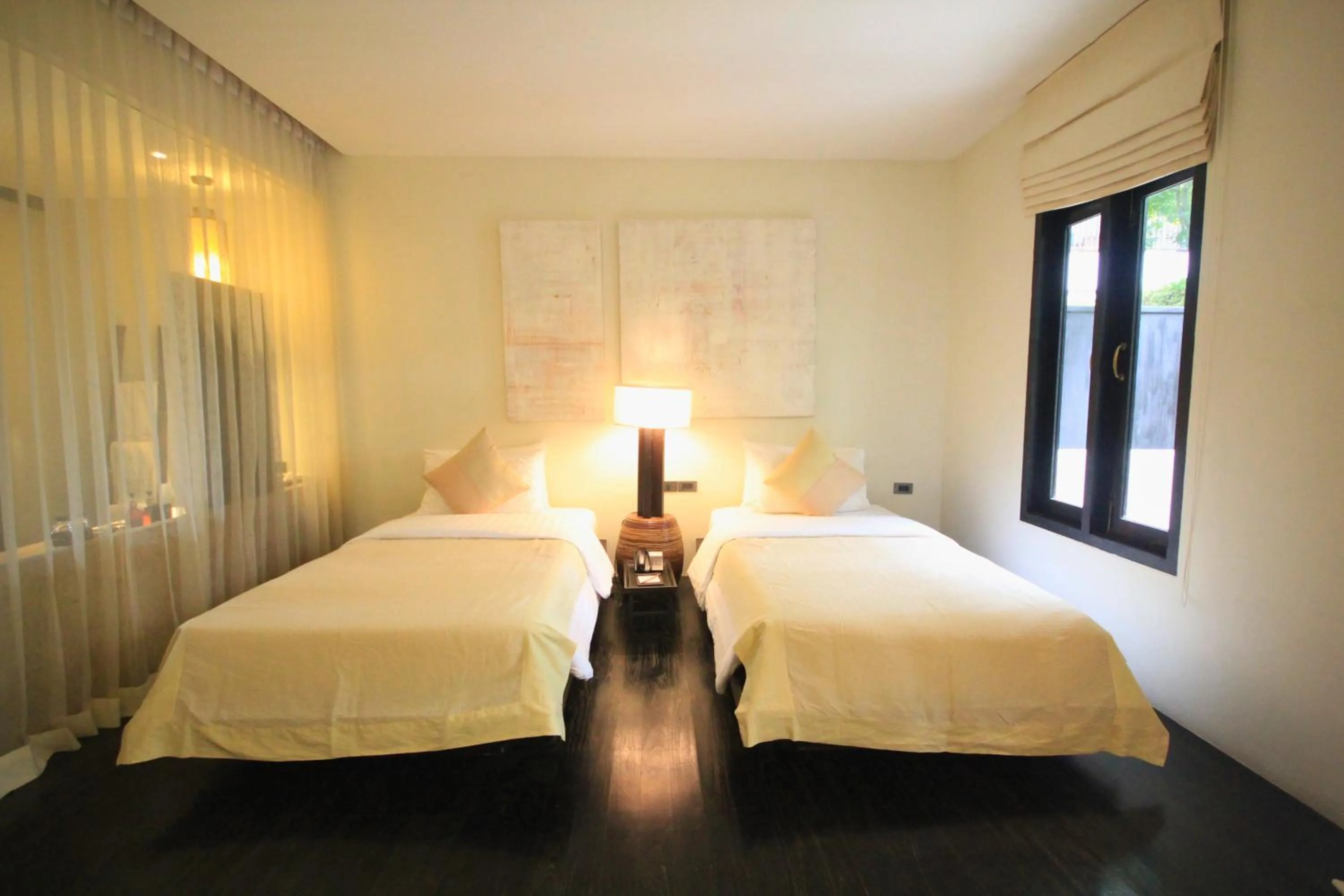 Bed in Aruntara Riverside Boutique Hotel
