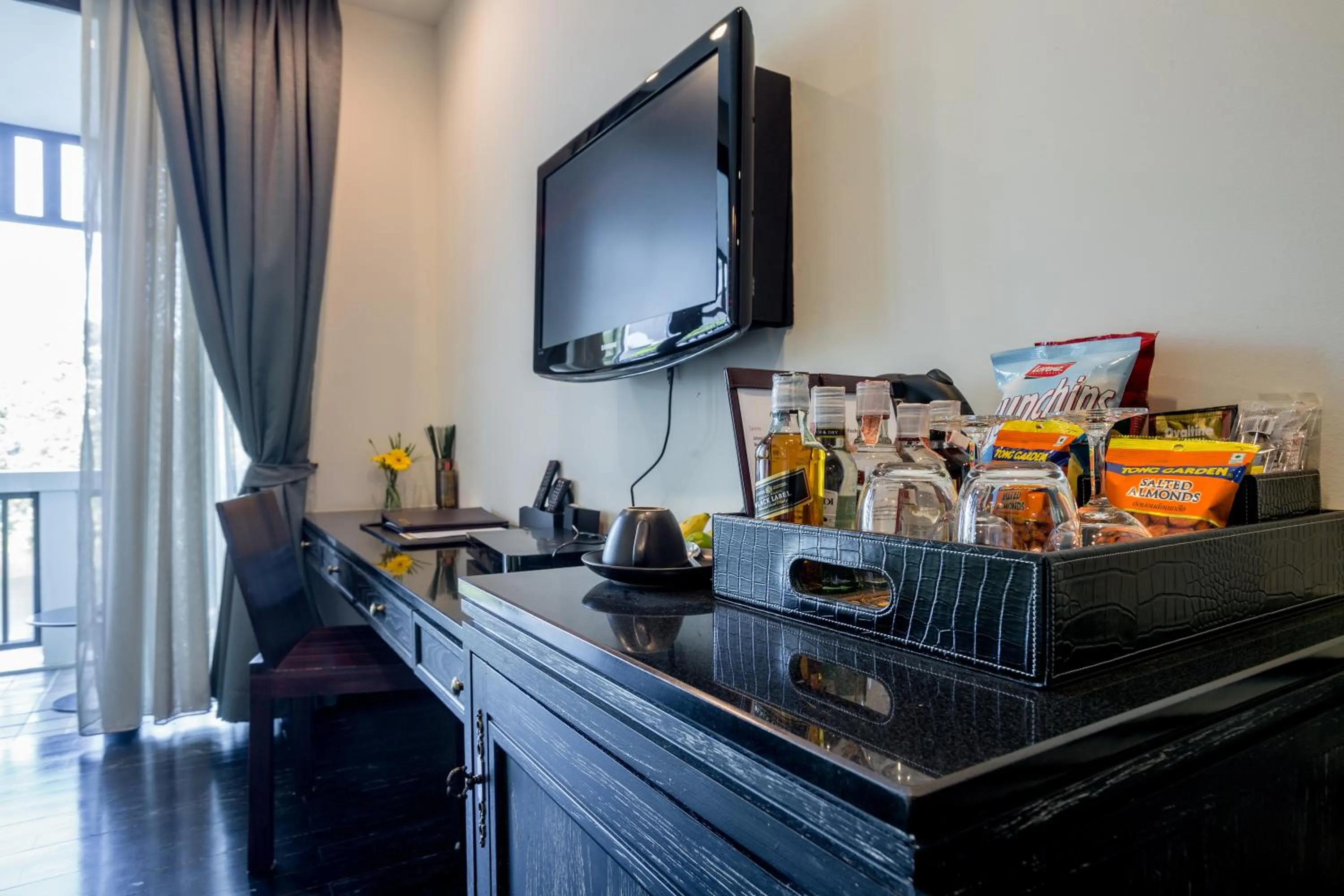 TV and multimedia in Aruntara Riverside Boutique Hotel