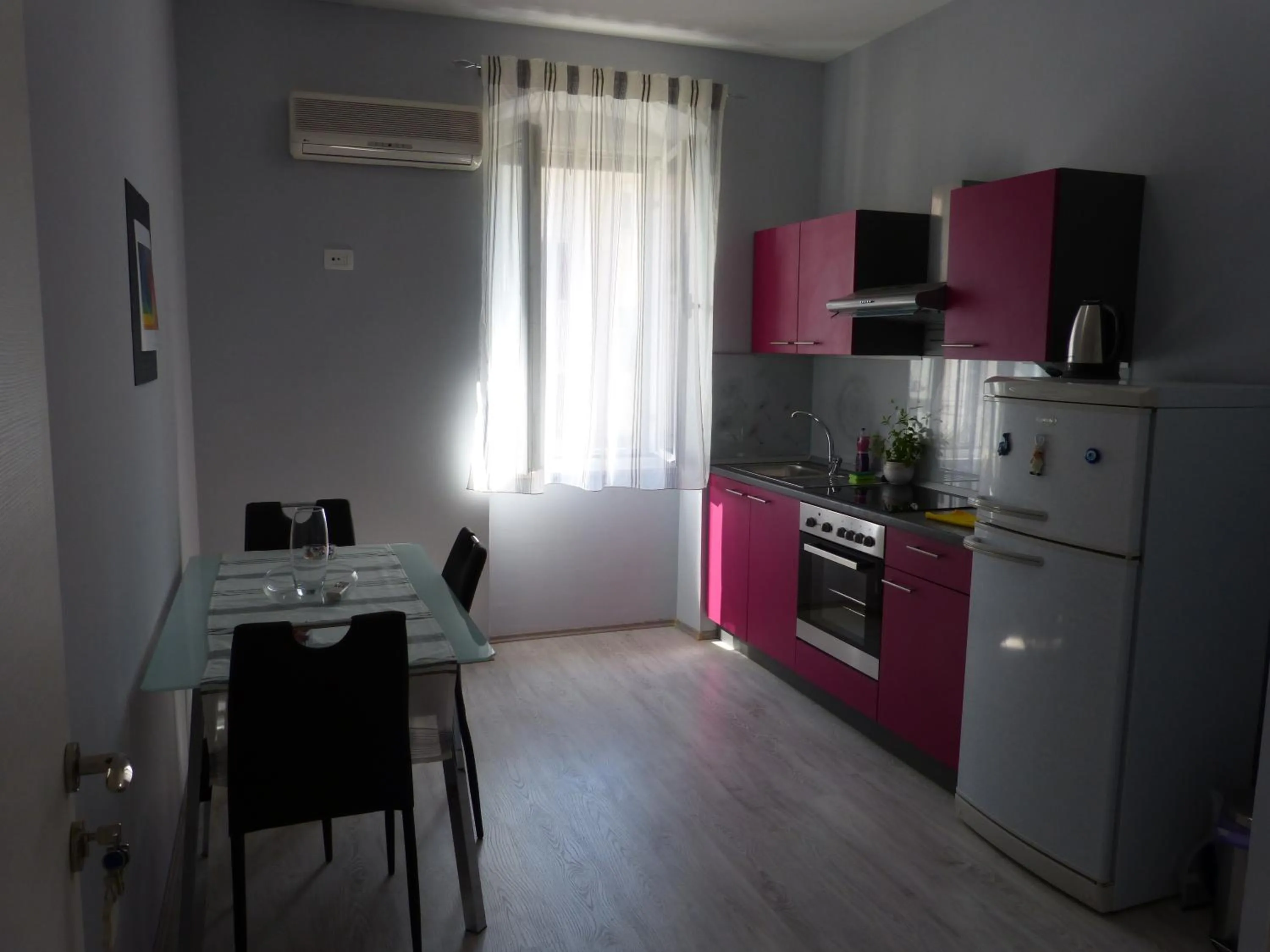 Kitchen or kitchenette in Pavelin apartments