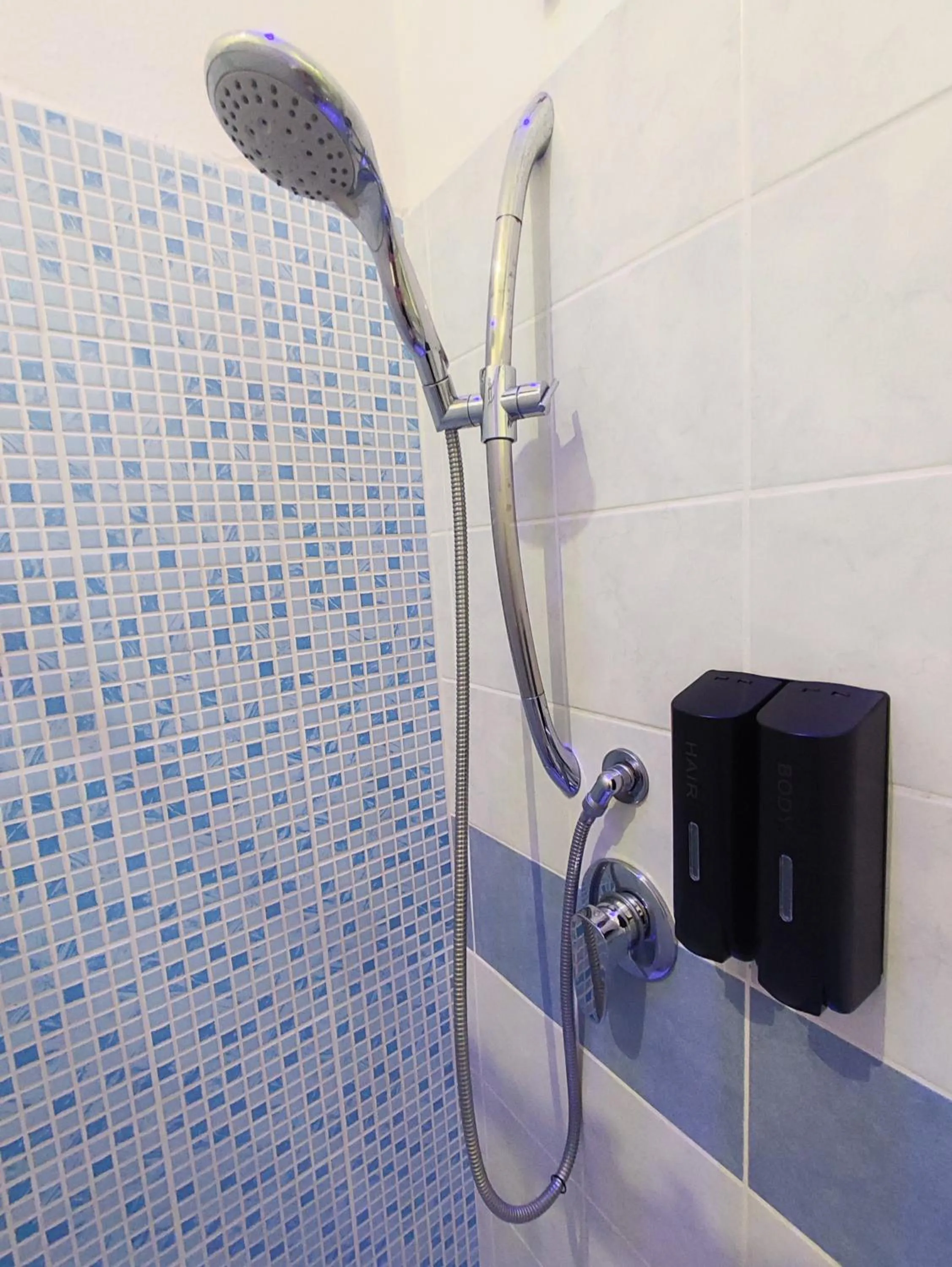 Bathroom in Manì Rooms