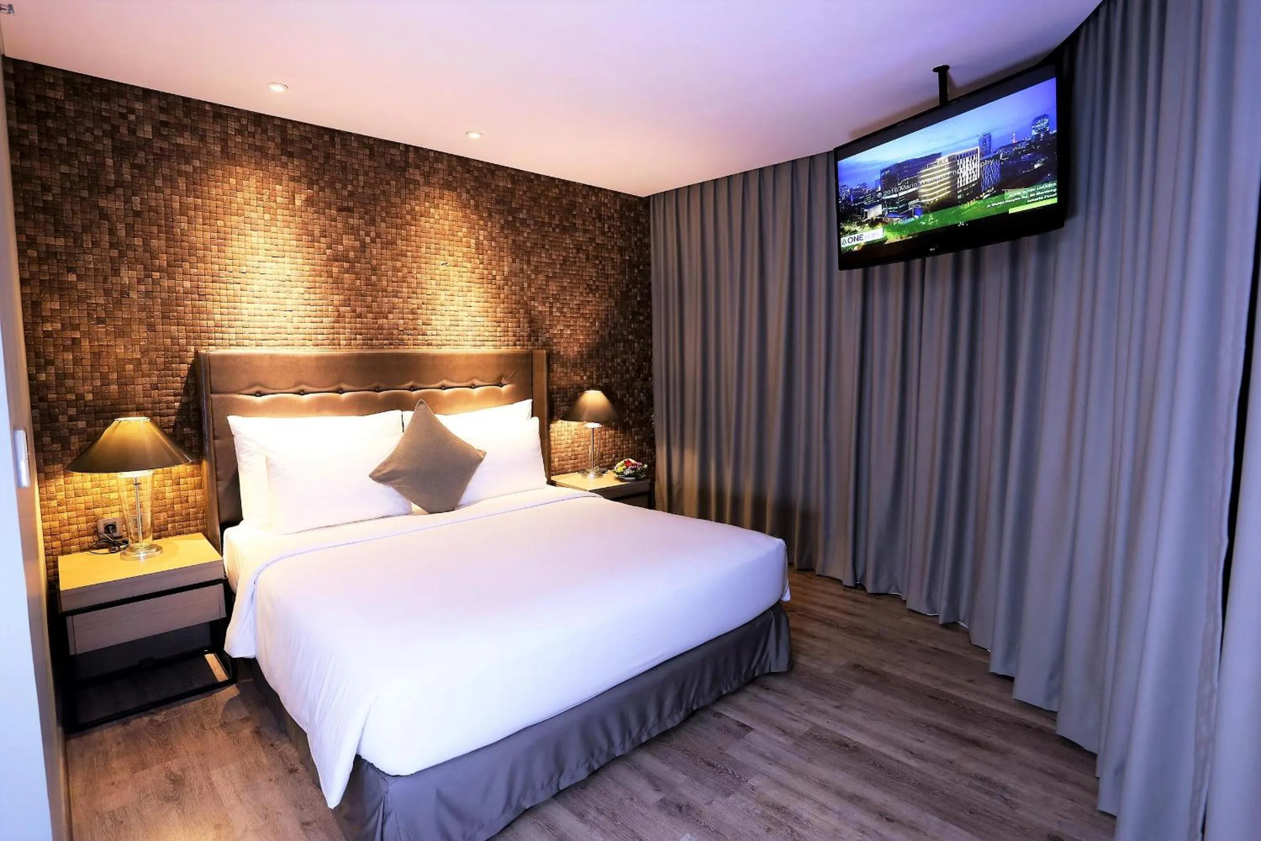 Bed in AONE Hotel