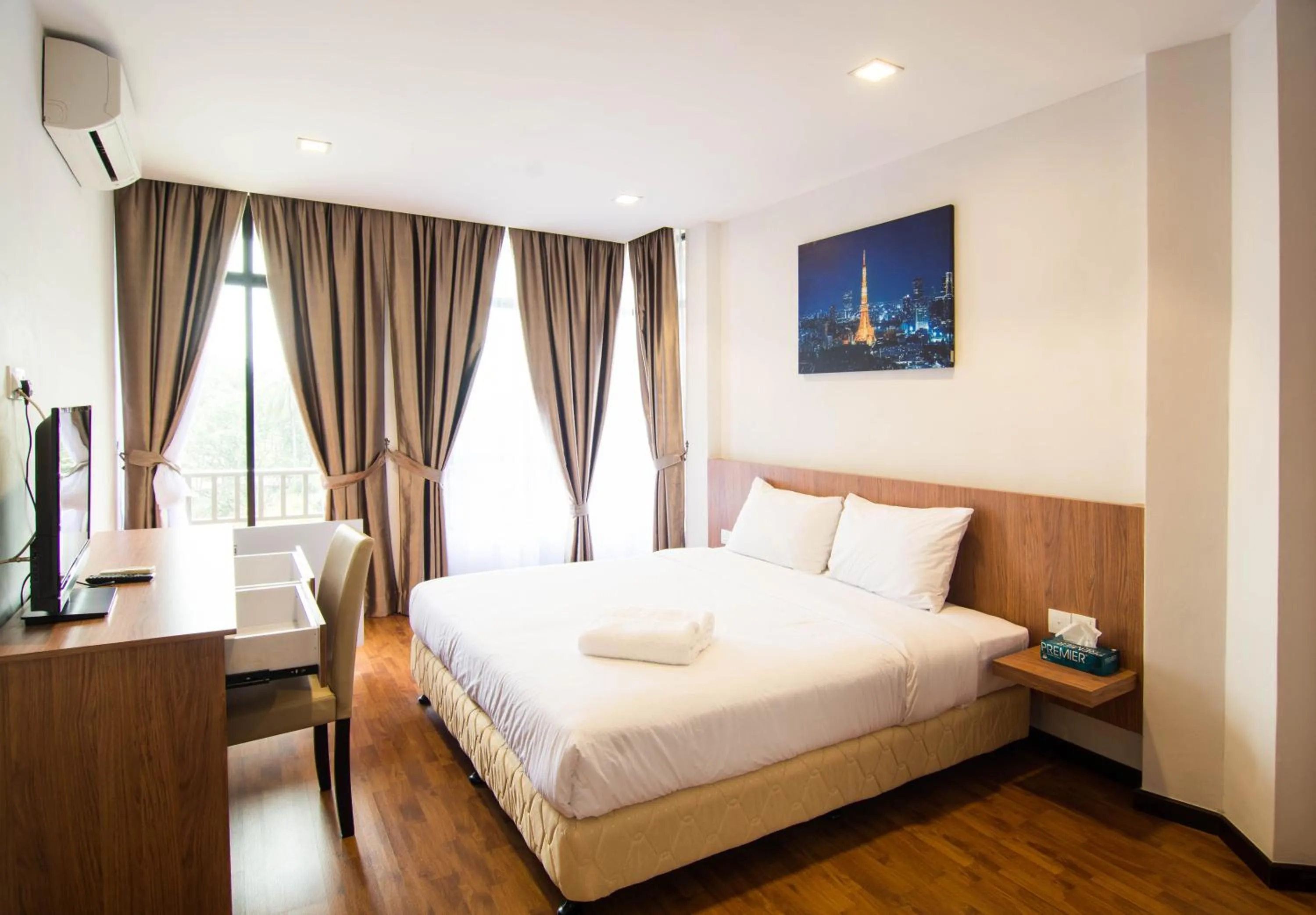 Bed in Holiday Homes At Samsuria Resort