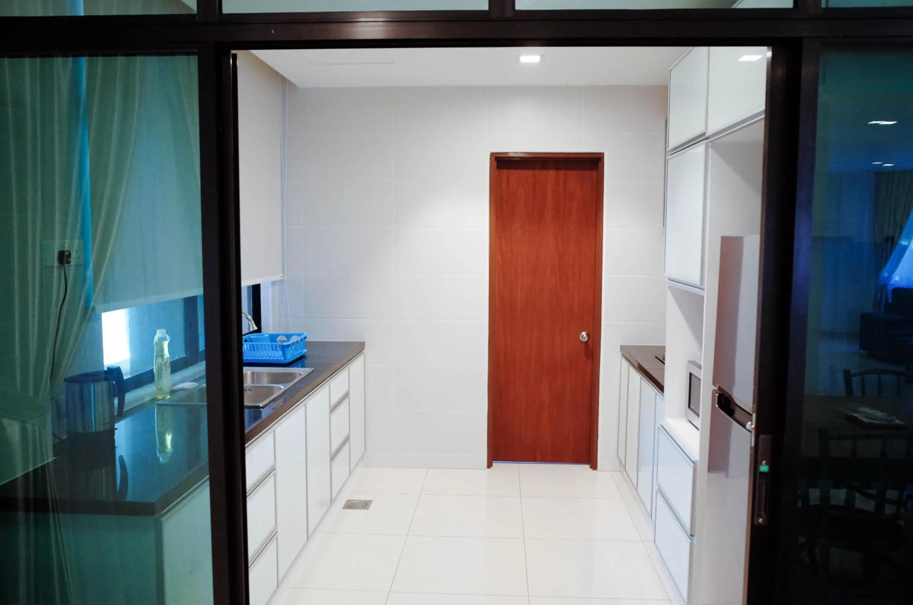Kitchen or kitchenette in Holiday Homes At Samsuria Resort