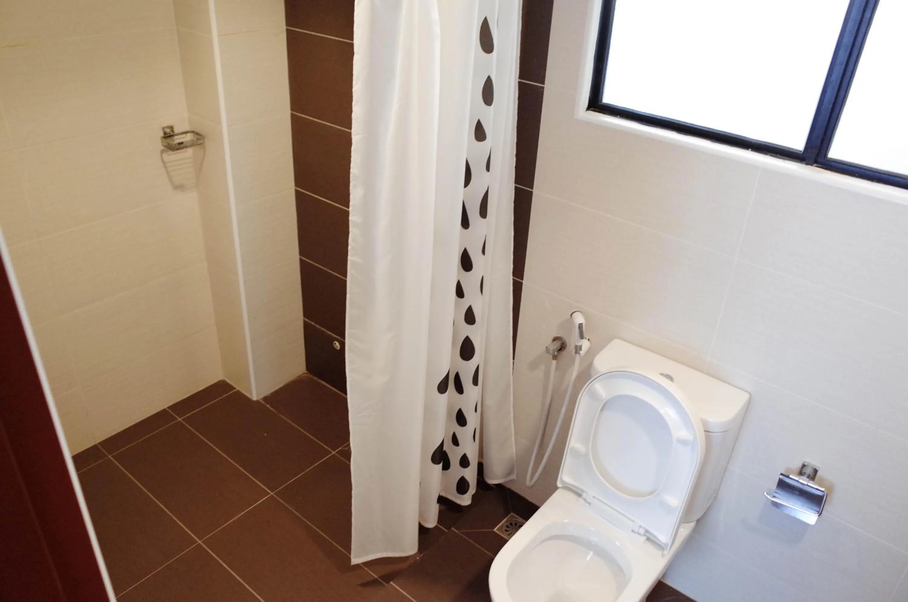 Bathroom in Holiday Homes At Samsuria Resort