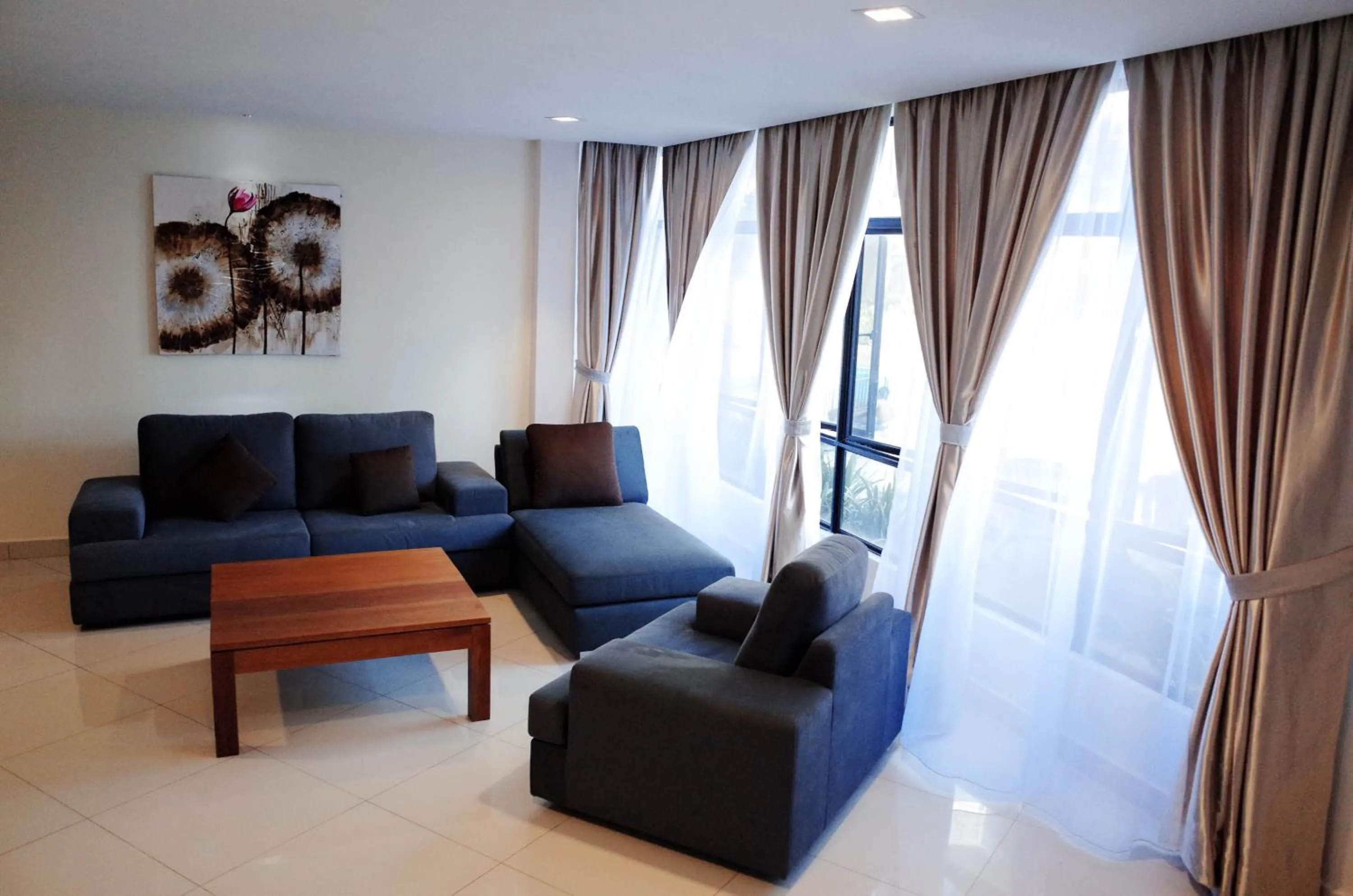 Communal lounge/ TV room in Holiday Homes At Samsuria Resort