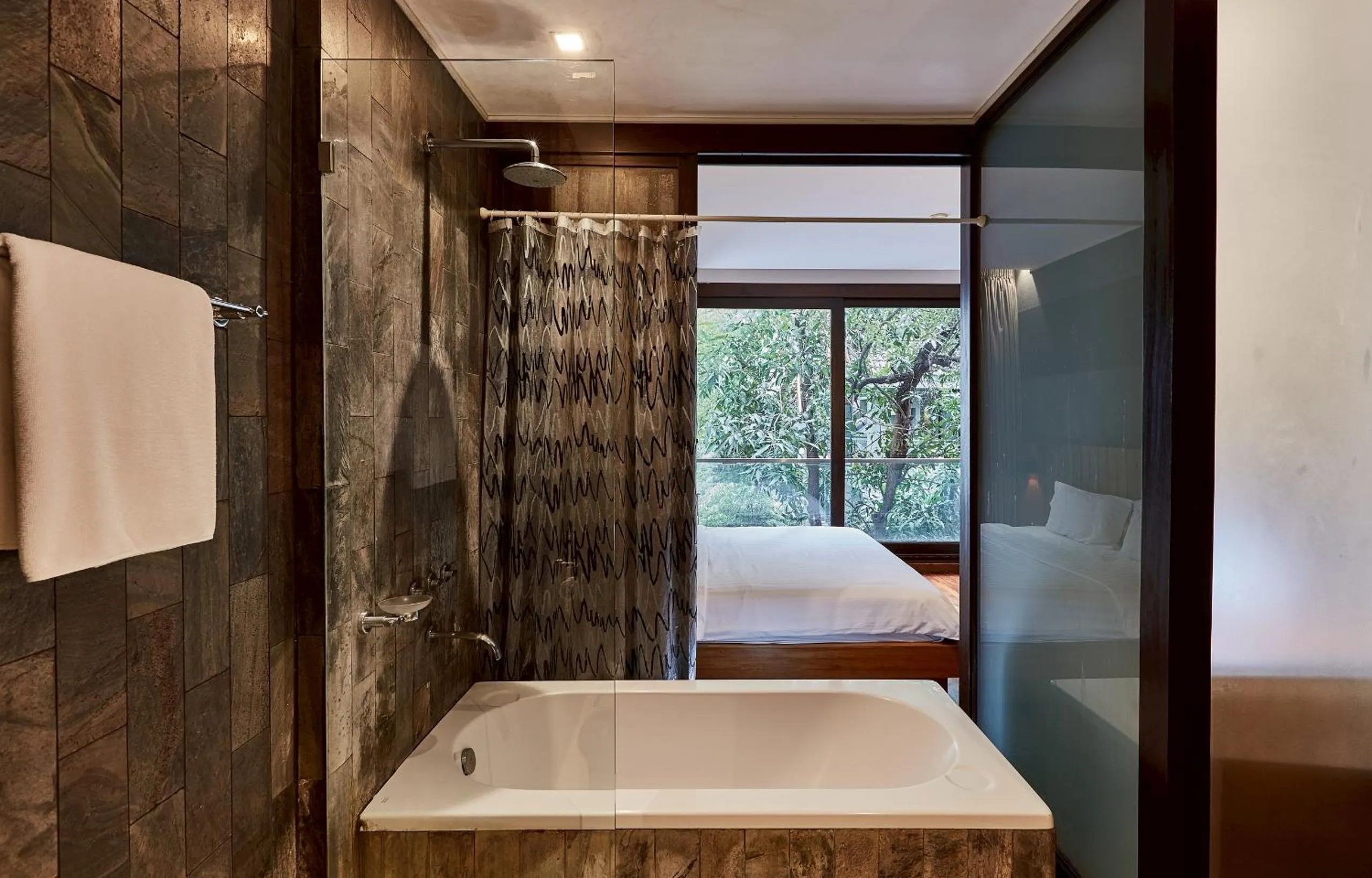 Bed in LUXX Langsuan Hotel - SHA Plus