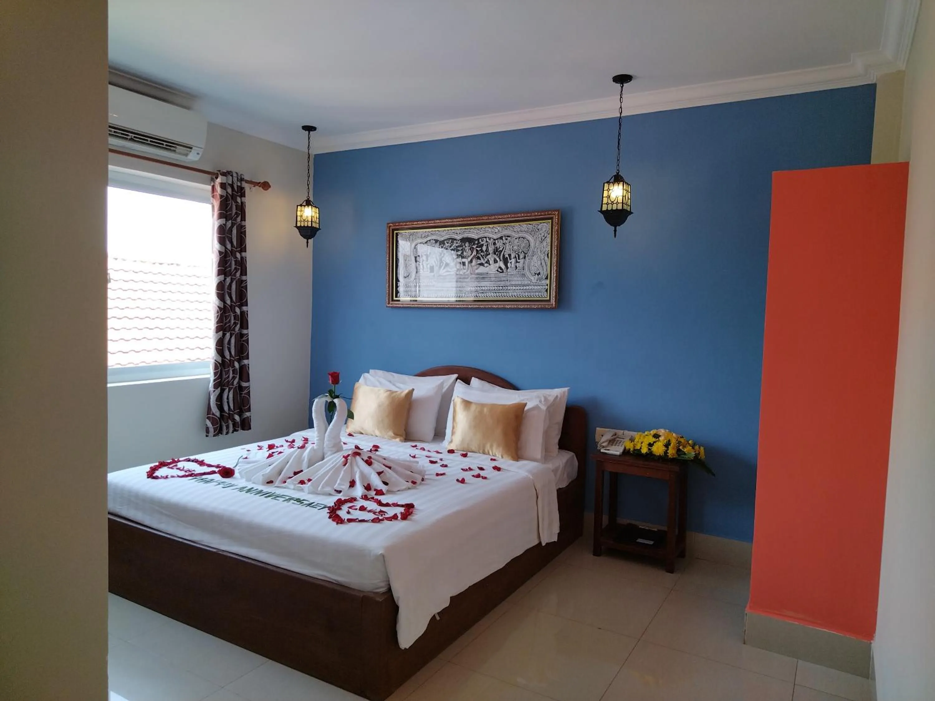 Bedroom in Plumeria Hotel & Spa