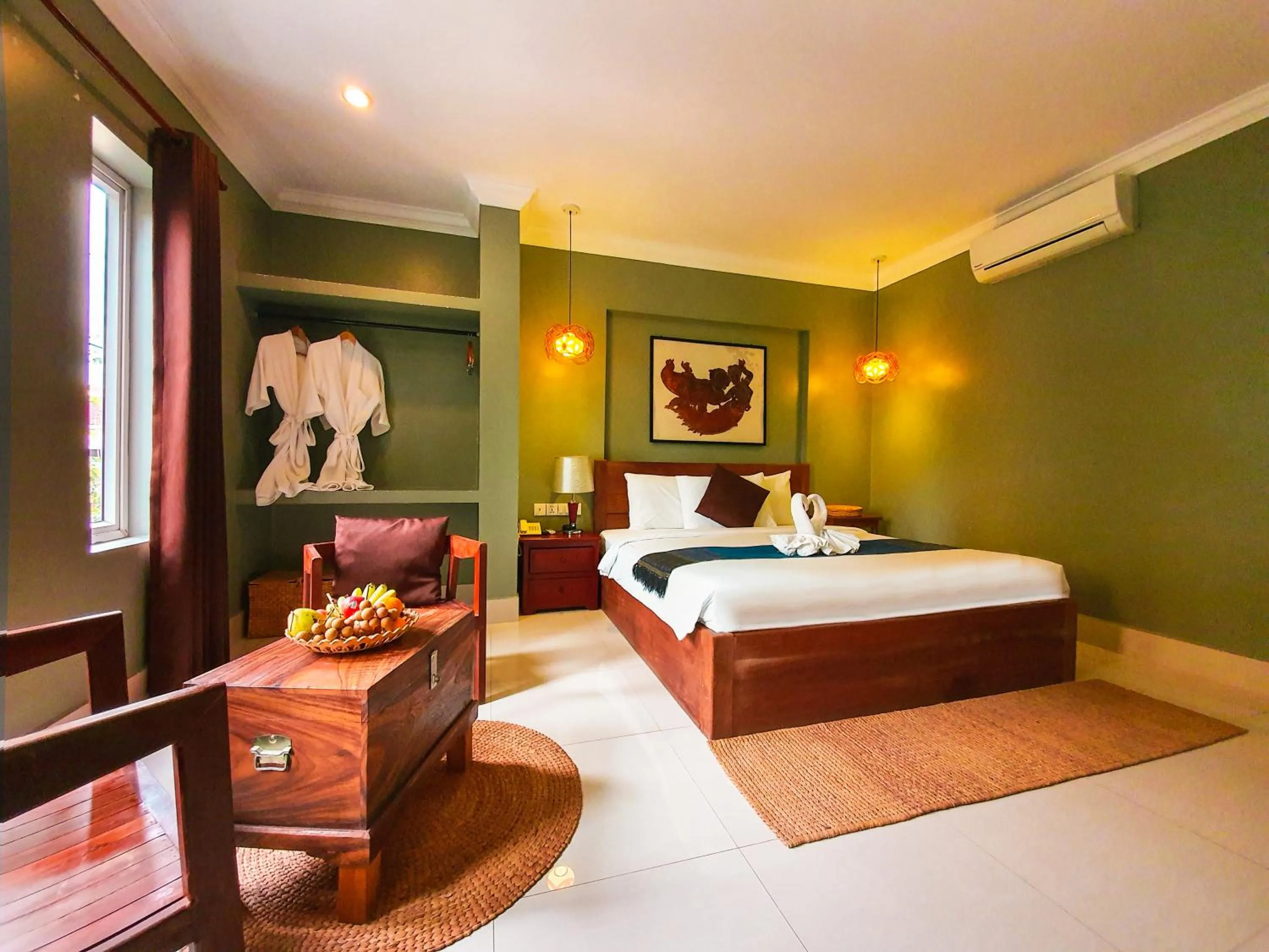 Bedroom in Plumeria Hotel & Spa