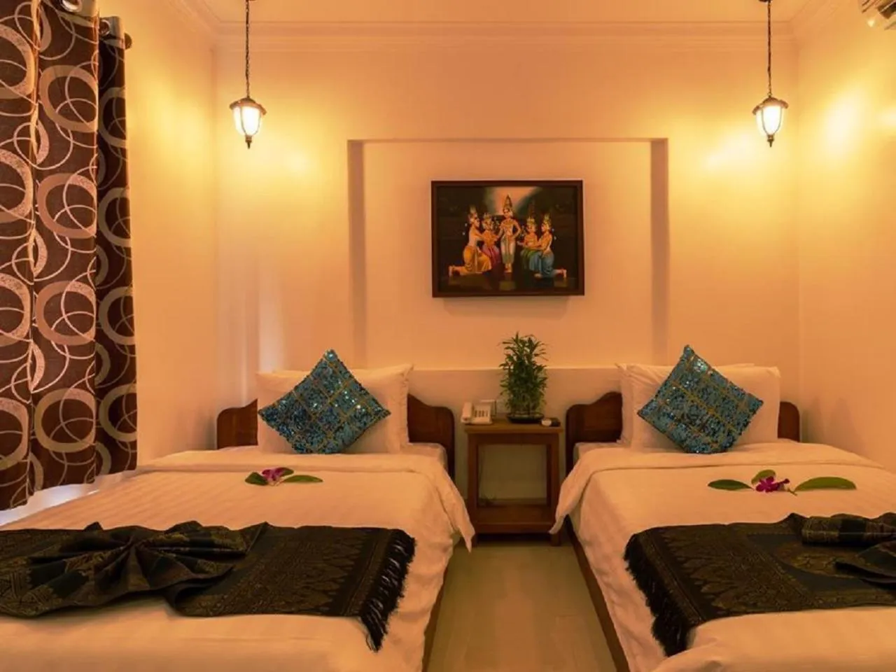 Bedroom in Plumeria Hotel & Spa