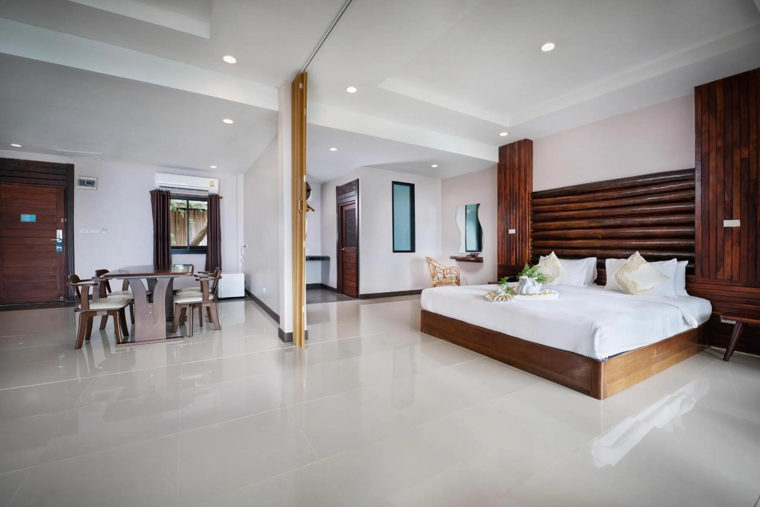 Photo of the whole room, Bed in Dusit Buncha Koh Tao by Riya Group