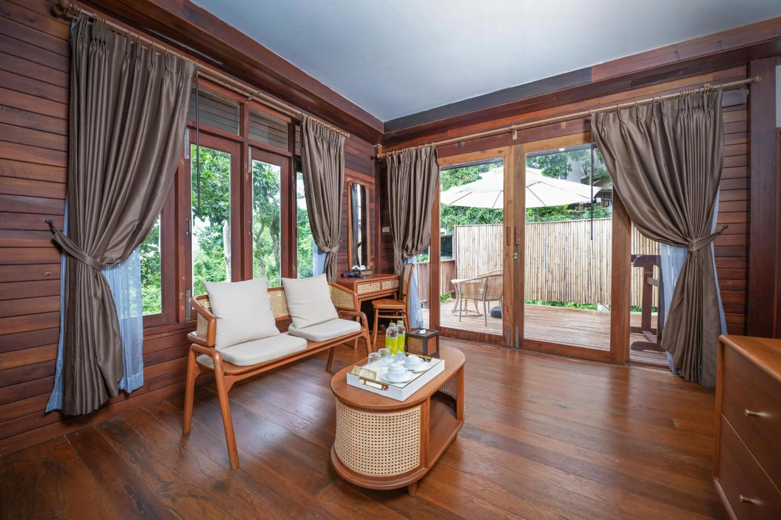 Living room in Dusit Buncha Koh Tao by Riya Group