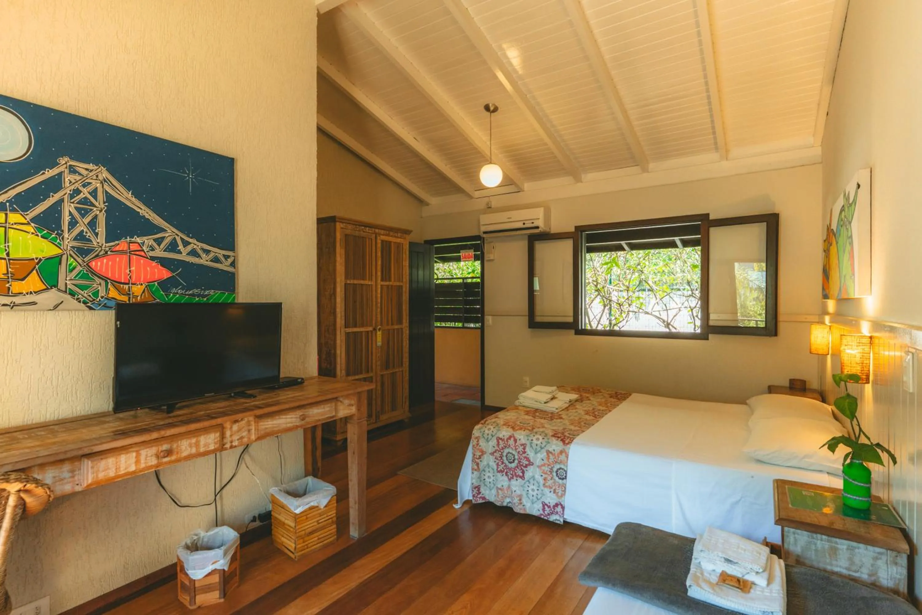Bed in Pousada Vila Tamarindo Eco Lodge