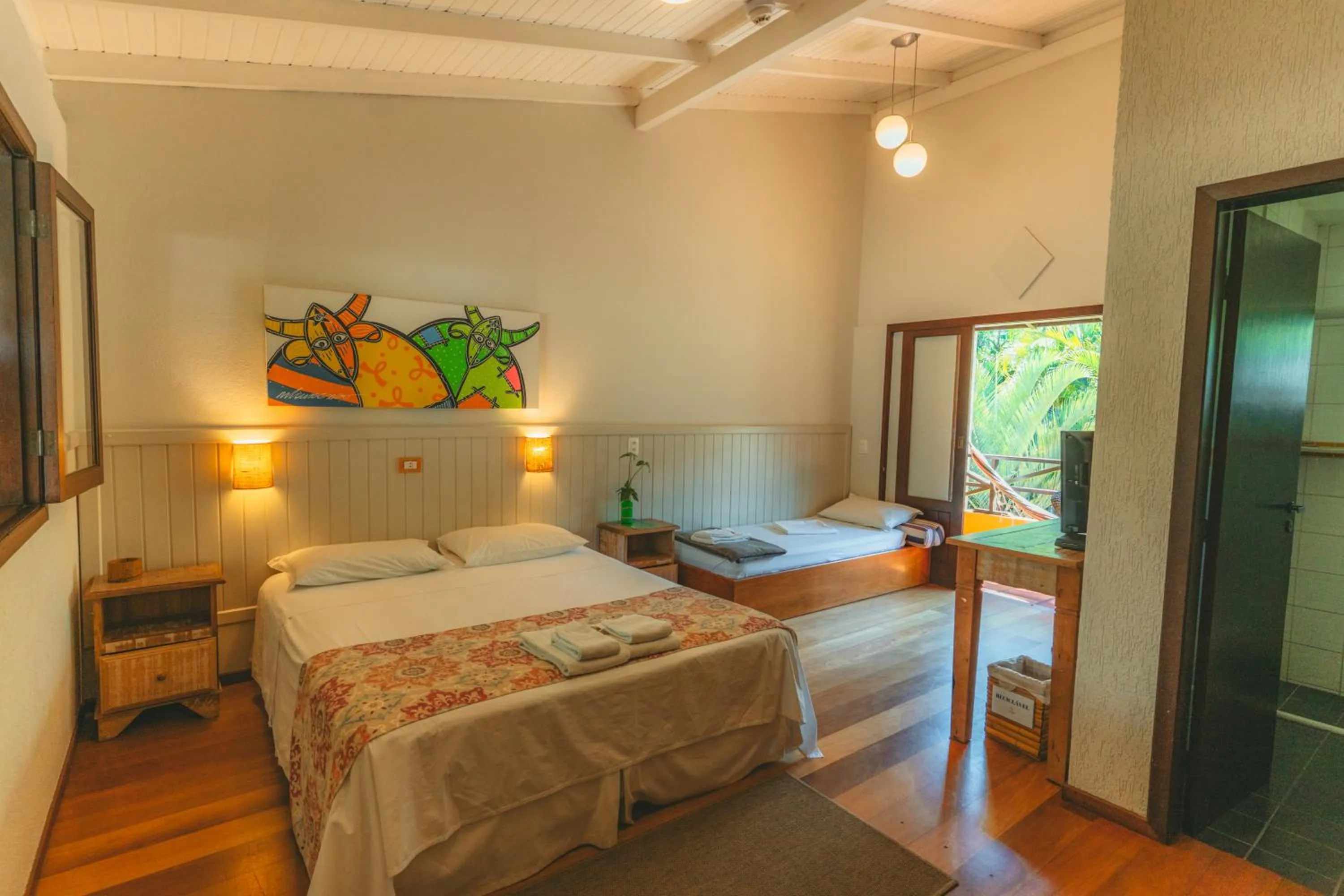 Bed in Pousada Vila Tamarindo Eco Lodge