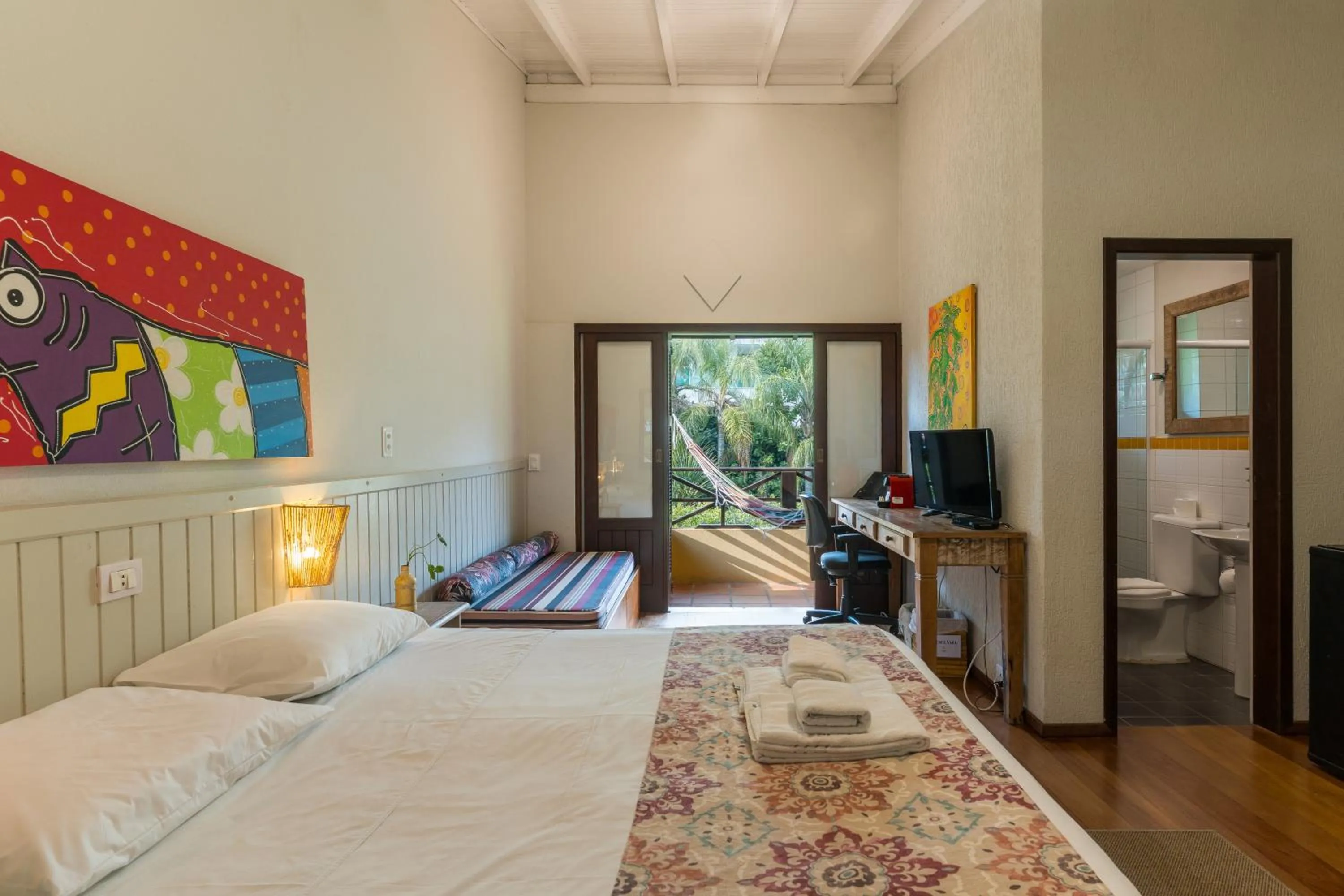 Bed in Pousada Vila Tamarindo Eco Lodge