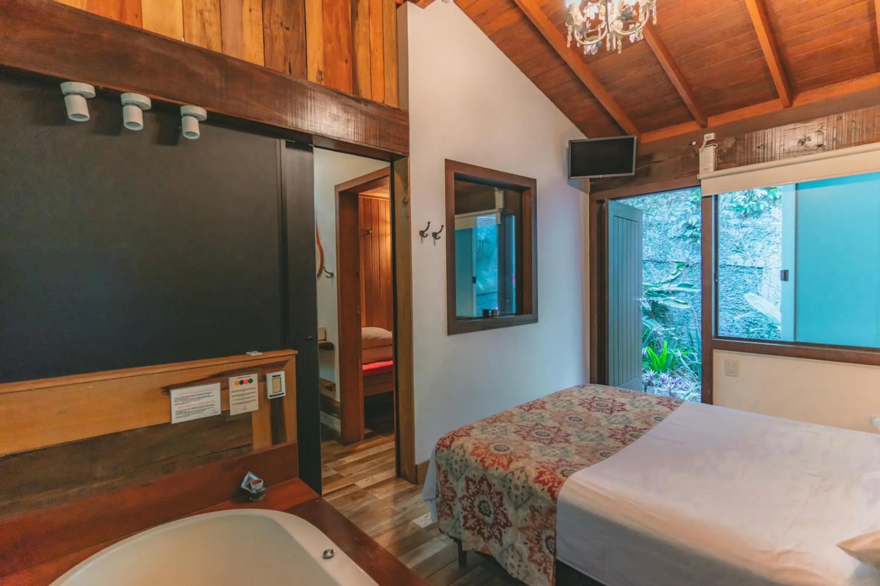 Bed in Pousada Vila Tamarindo Eco Lodge