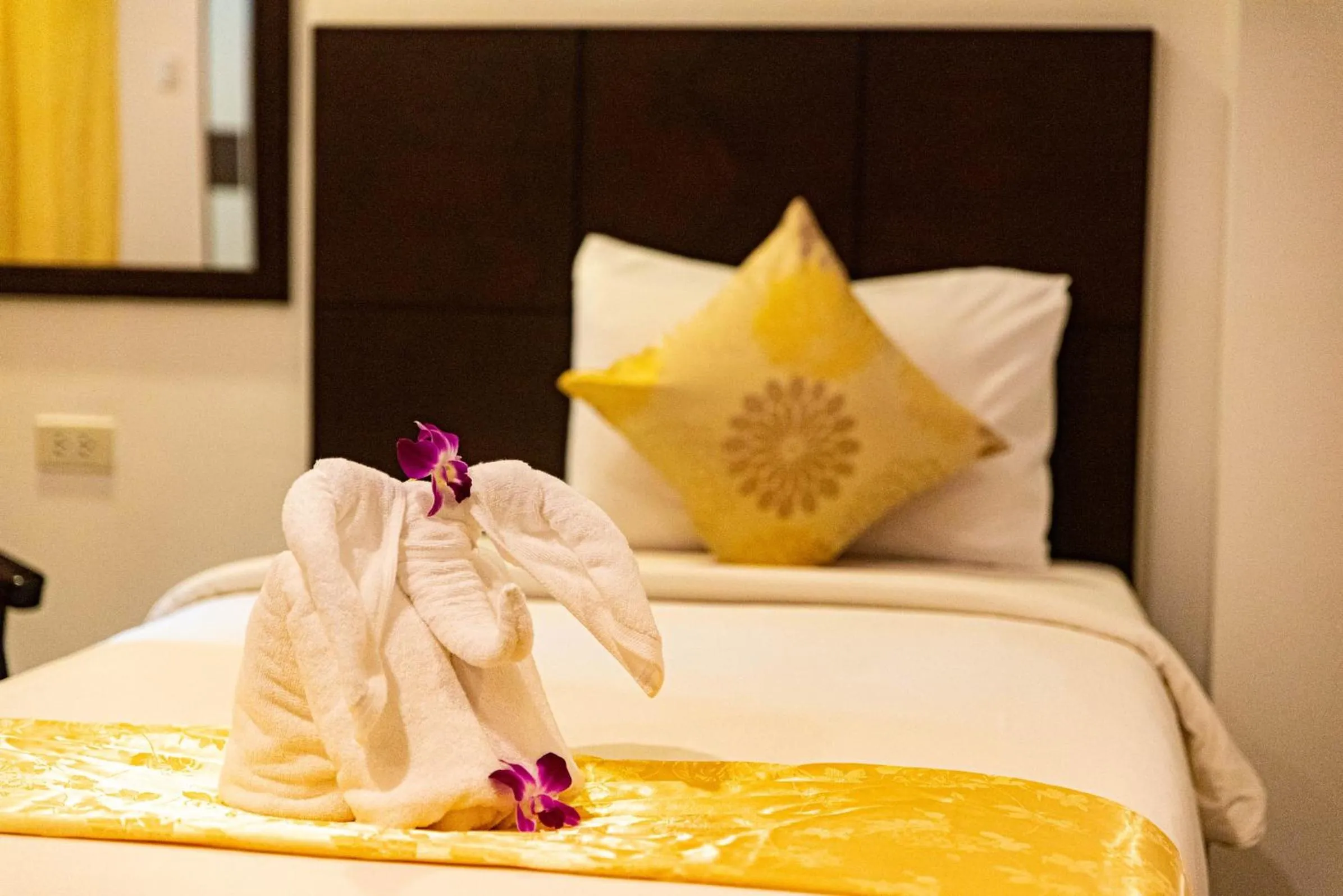 Bed in Q Victory Patong Hotel