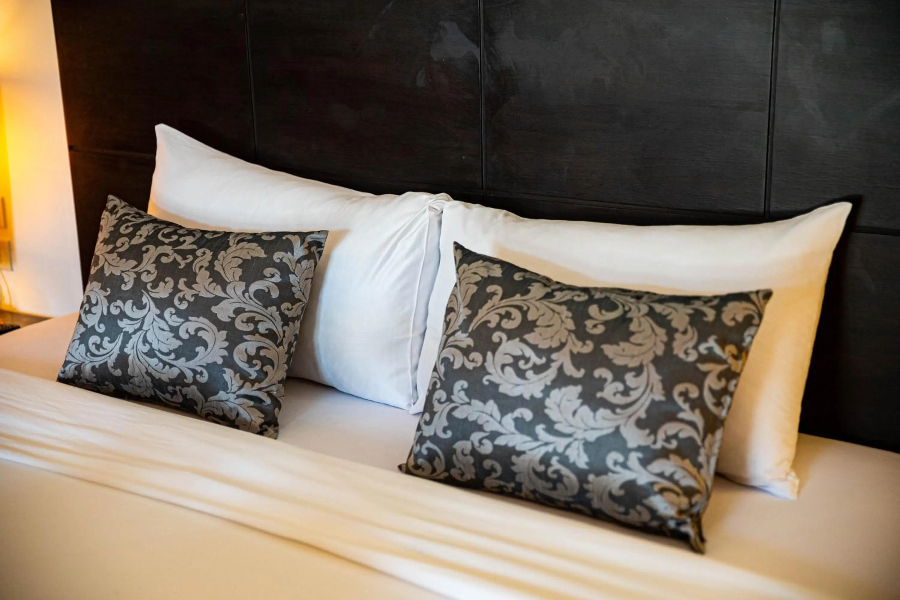 Bed in Q Victory Patong Hotel