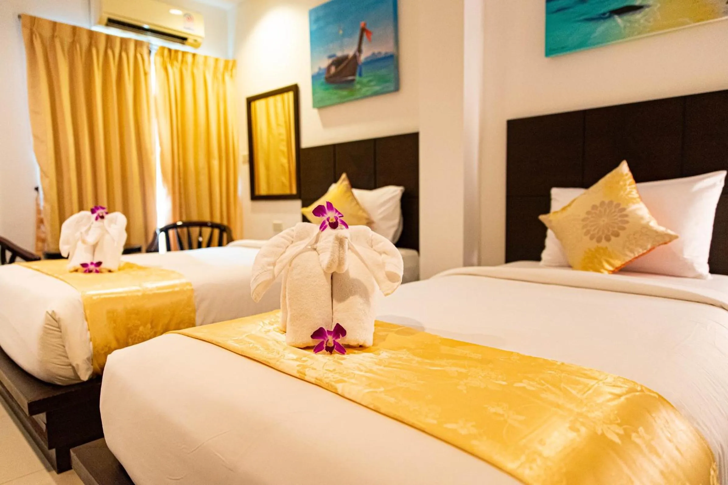 Bed in Q Victory Patong Hotel