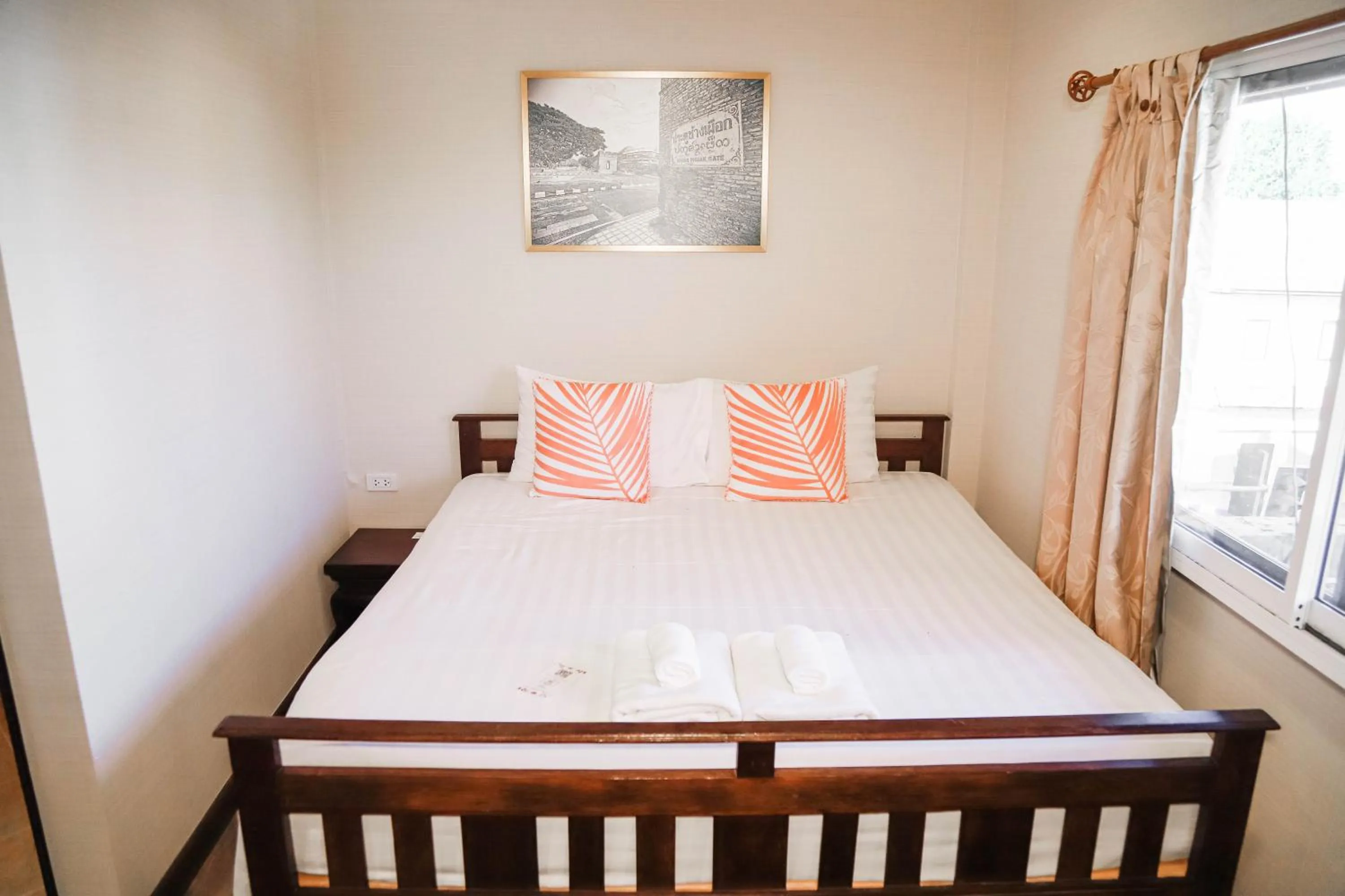 Bed in Parasol Inn Chiang Mai Old City