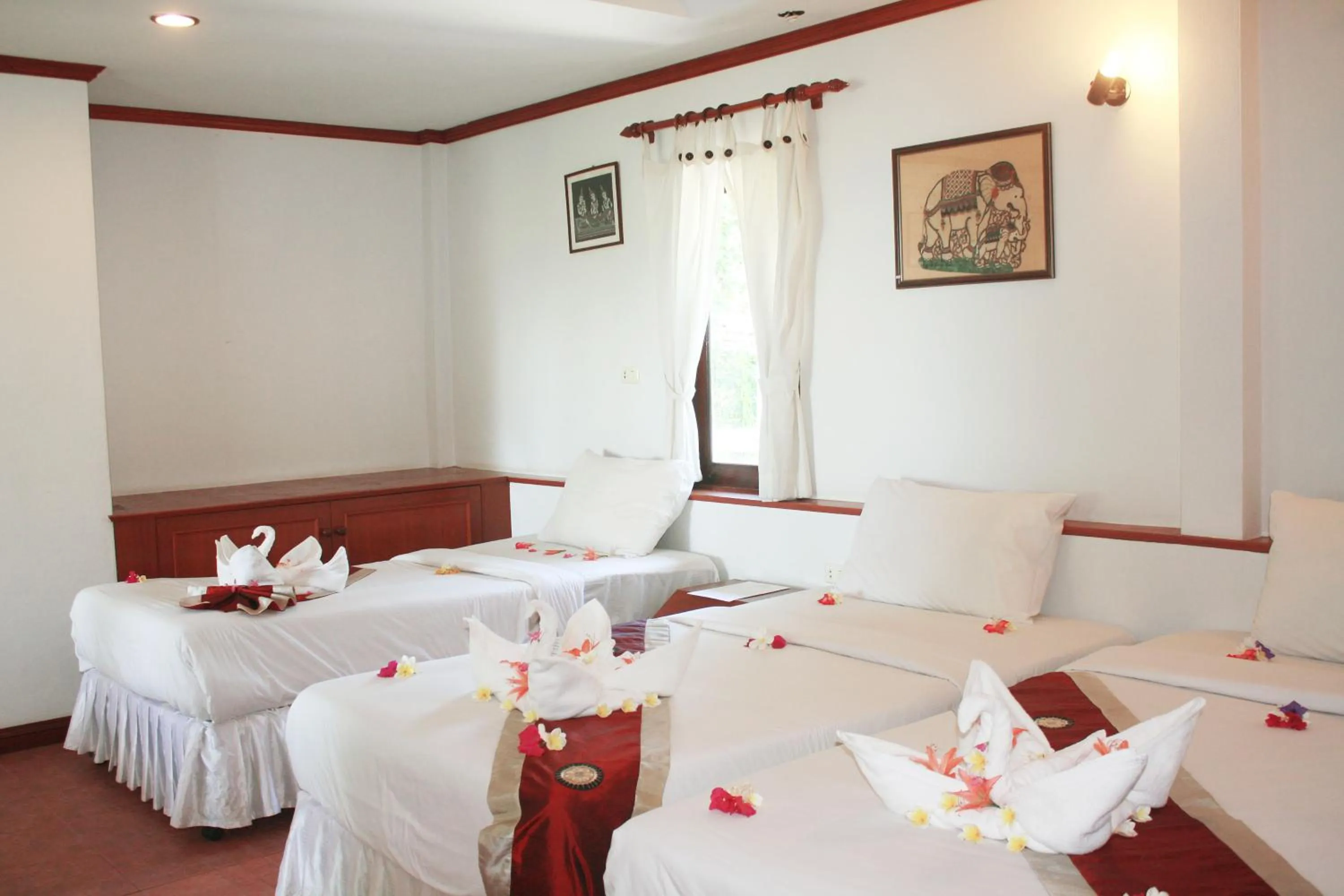 Bedroom in Samui Honey Cottages Beach Resort - SHA Extra Plus