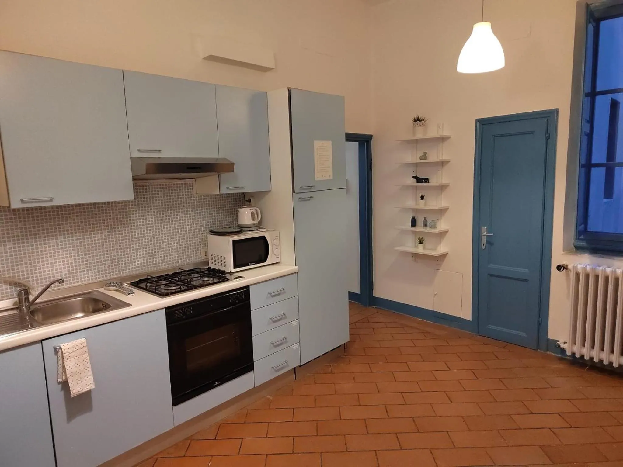 Kitchen or kitchenette in Michelangelo's Relais