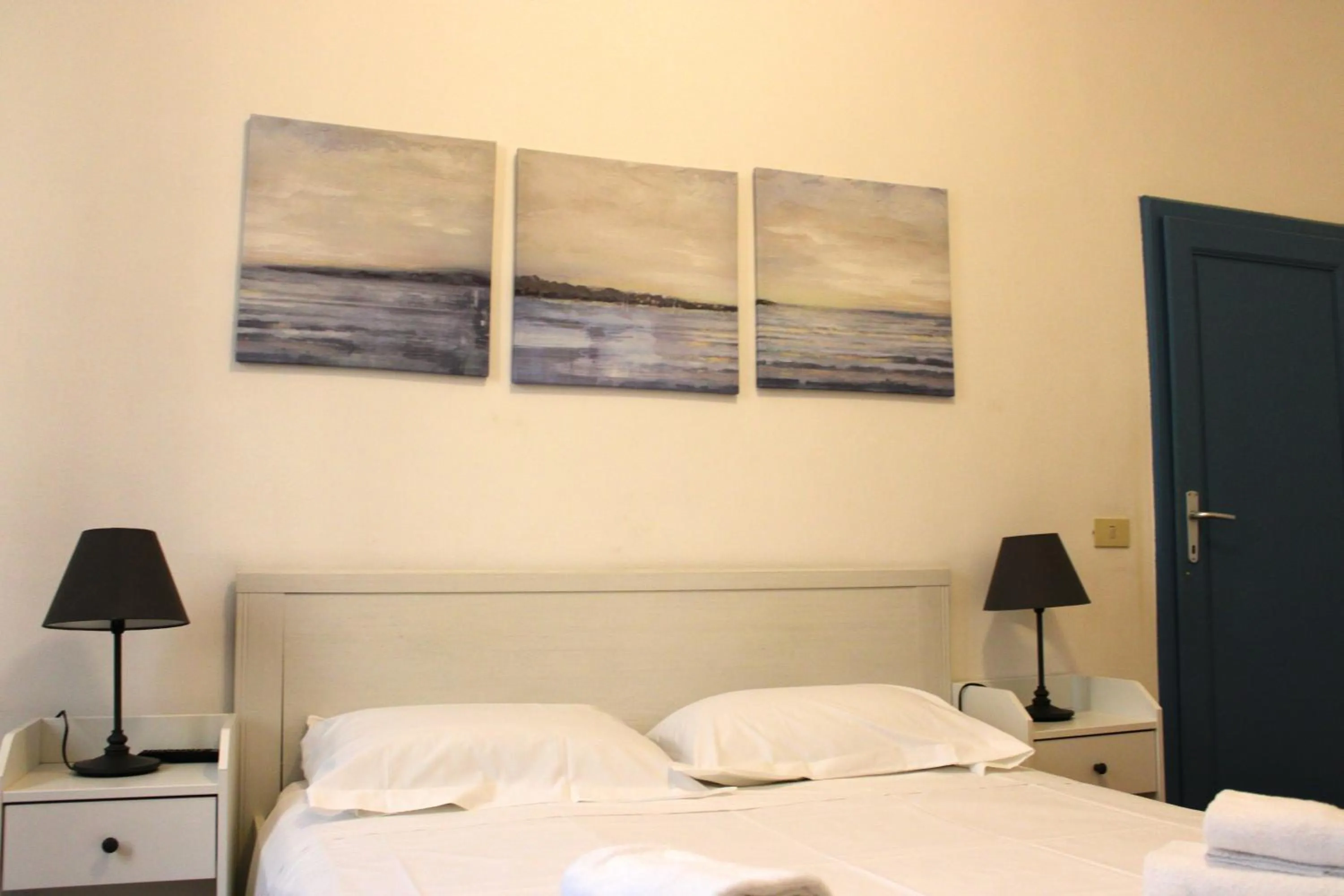 Bed in Michelangelo's Relais