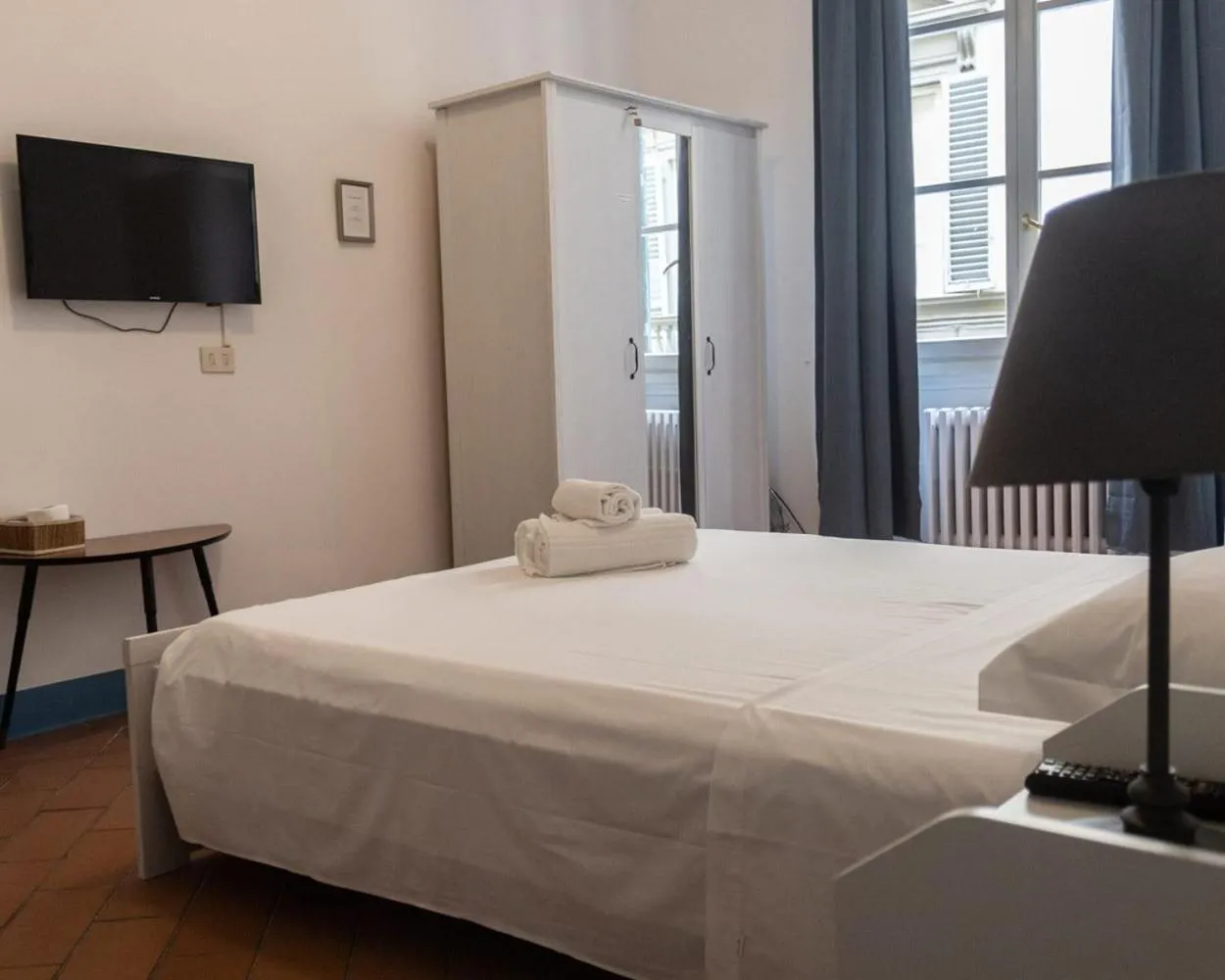 Bed in Michelangelo's Relais
