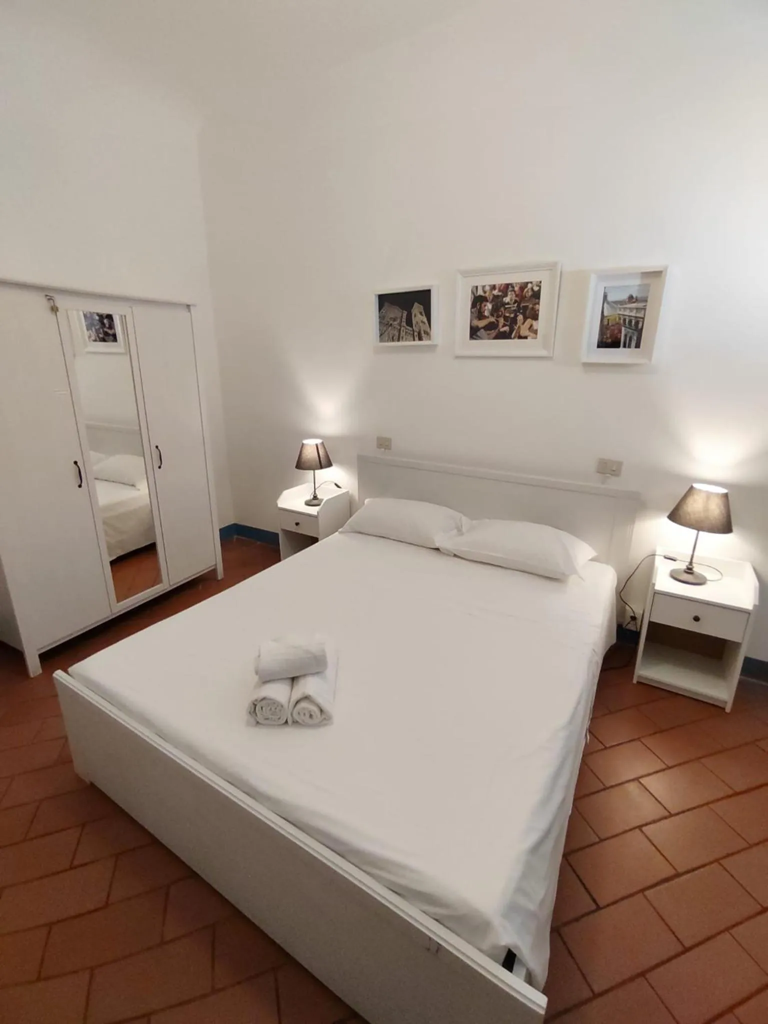 Bed in Michelangelo's Relais