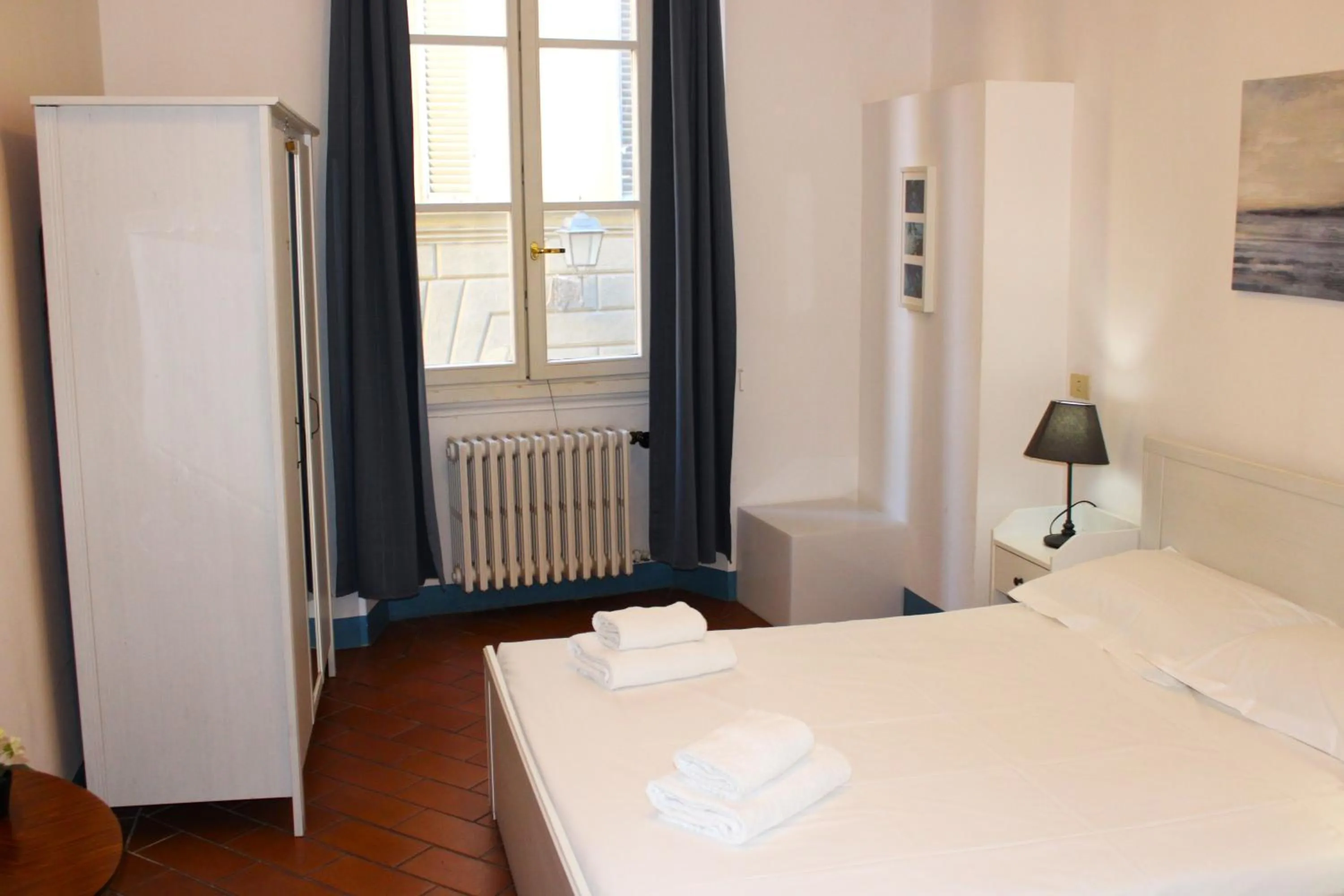 Bed in Michelangelo's Relais